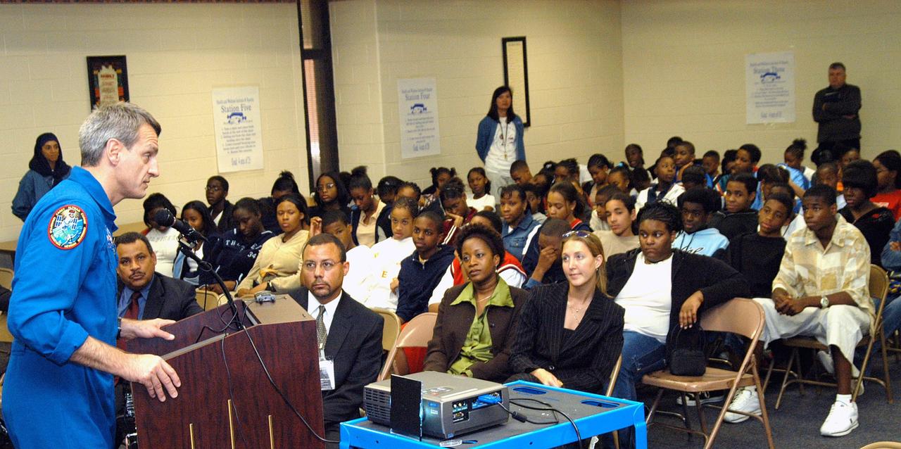 KENNEDY SPACE CENTER, FLA. -  Astronaut Rick Linnehan shares his experiences in space with students and faculty at Ralph Bunche Middle School, a NASA Explorer School, in Atlanta, Ga.  Linnehan accompanied Center Director Jim Kennedy, who is visiting NES sites to share America’s new vision for space exploration with the next generation of explorers.  The purpose of the school visit is to talk with students about our destiny as explorers, NASA’s stepping stone approach to exploring Earth, the Moon, Mars and beyond, how space impacts our lives, and how people and machines rely on each other in space.