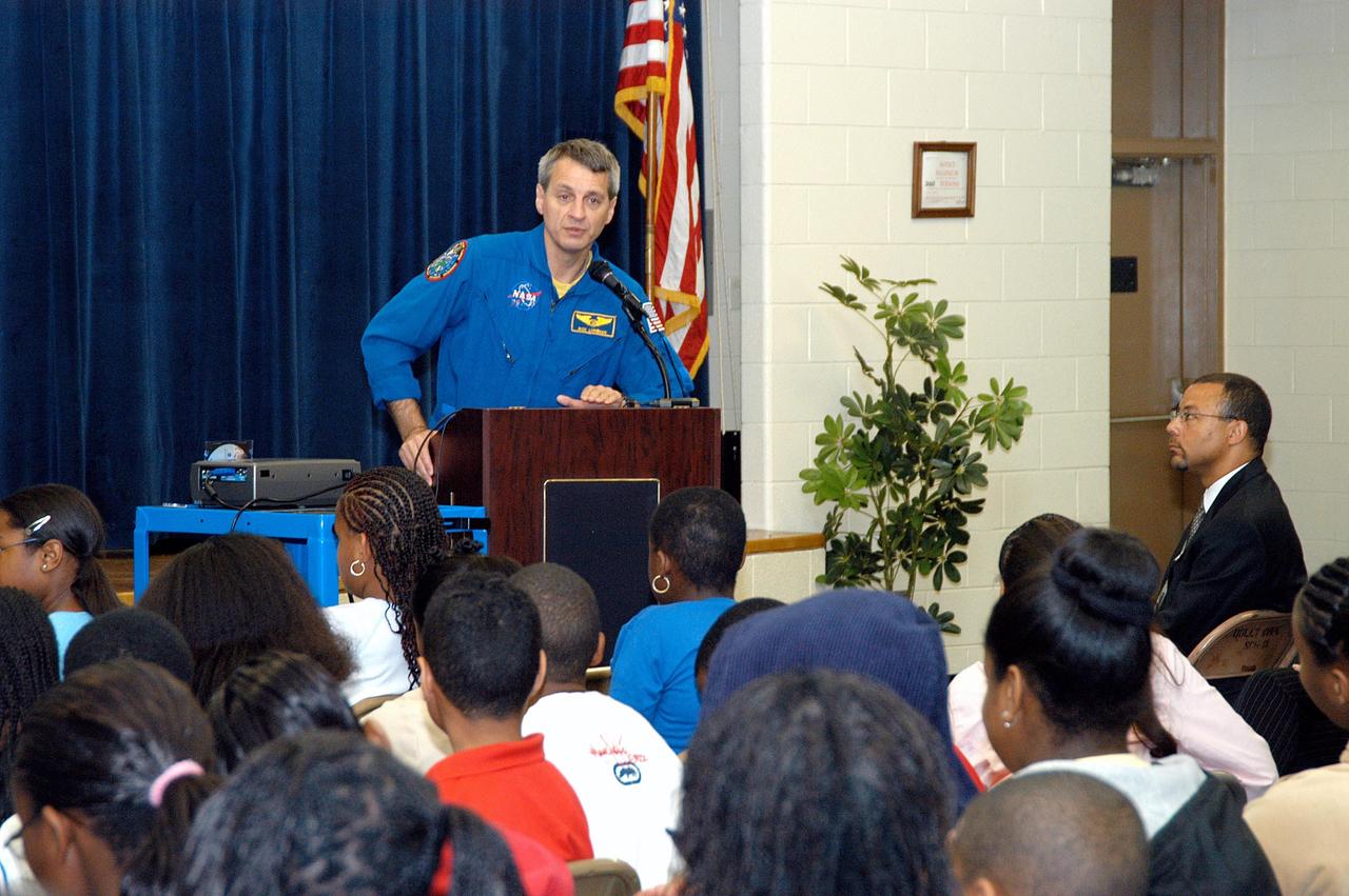 KENNEDY SPACE CENTER, FLA. -  Astronaut Rick Linnehan shares his experiences in space with students and faculty at Ralph Bunche Middle School, a NASA Explorer School, in Atlanta, Ga.  Linnehan accompanied Center Director Jim Kennedy, who is visiting NES sites to share America’s new vision for space exploration with the next generation of explorers.  The purpose of the school visit is to talk with students about our destiny as explorers, NASA’s stepping stone approach to exploring Earth, the Moon, Mars and beyond, how space impacts our lives, and how people and machines rely on each other in space.