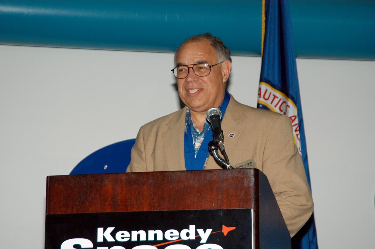 KENNEDY SPACE CENTER, FLA. -- At the Kennedy Space Center Visitor Complex, NASA Deputy Administrator Frederick D. Gregory is inducted into the U.S. Astronaut Hall of Fame. Gregory was the first African-American to command a space mission. Also chosen for this honor in 2004 are Kathryn D. Sullivan, the first American woman to walk in space; Richard O. Covey, commander of the Hubble Space Telescope repair mission; Norman E. Thagard, the first American to occupy Russia's Mir space station; and the late Francis R. "Dick" Scobee, commander of the ill-fated 1986 Challenger mission. The U.S. Astronaut Hall of Fame opened in 1990 to provide a place where space travelers could be remembered for their participation and accomplishments in the U.S. space program. To be eligible for induction, an individual must have been a U.S. citizen, a NASA astronaut, and out of the active astronaut corps at least five years. The five inductees join 52 previously honored astronauts from the ranks of the Gemini, Apollo, Skylab, Apollo-Soyuz, and Space Shuttle programs.