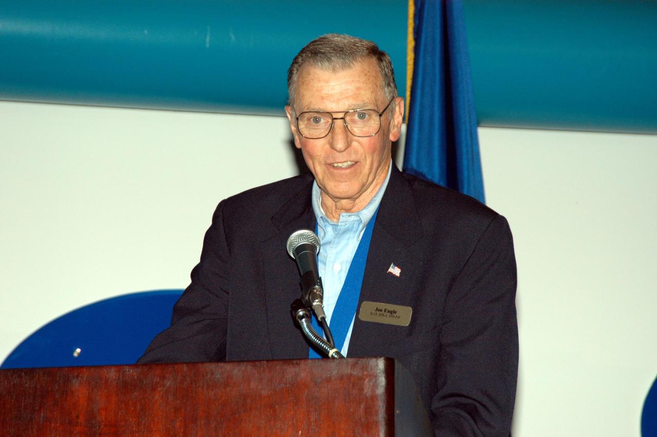 KENNEDY SPACE CENTER, FLA. -- At the Kennedy Space Center Visitor Complex, former NASA astronaut Joe H. Engle participates in the 2004 U.S. Astronaut Hall of Fame induction ceremony. He is introducing inductee Richard O. Covey, commander of the Hubble Space Telescope repair mission. Also chosen for induction in 2004 are Kathryn D. Sullivan, the first American woman to walk in space; Frederick D. Gregory, the first African-American to command a space mission; Norman E. Thagard, the first American to occupy Russia's Mir space station; and the late Francis R. "Dick" Scobee, commander of the ill-fated 1986 Challenger mission. The U.S. Astronaut Hall of Fame opened in 1990 to provide a place where space travelers could be remembered for their participation and accomplishments in the U.S. space program. To be eligible for induction, an individual must have been a U.S. citizen, a NASA astronaut, and out of the active astronaut corps at least five years. The five inductees join 52 previously honored astronauts from the ranks of the Gemini, Apollo, Skylab, Apollo-Soyuz, and Space Shuttle programs.