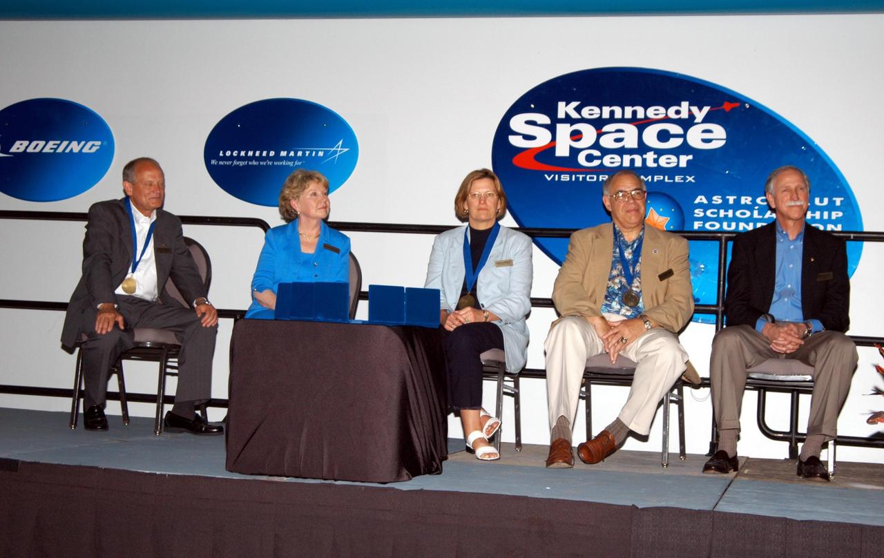 KENNEDY SPACE CENTER, FLA. -- At the Kennedy Space Center Visitor Complex, five space heroes are being inducted into the U.S. Astronaut Hall of Fame. From left, they are Norman E. Thagard, the first American to occupy Russia's Mir space station; June Scobee, representing her late husband Francis R. "Dick" Scobee, commander of the ill-fated 1986 Challenger mission; Kathryn D. Sullivan, the first American woman to walk in space; Frederick D. Gregory, the first African-American to command a space mission and the current NASA Deputy Administrator; and Richard O. Covey, commander of the Hubble Space Telescope repair mission. The U.S. Astronaut Hall of Fame opened in 1990 to provide a place where space travelers could be remembered for their participation and accomplishments in the U.S. space program. To be eligible for induction, an individual must have been a U.S. citizen, a NASA astronaut, and out of the active astronaut corps at least five years. The five inductees join 52 previously honored astronauts from the ranks of the Gemini, Apollo, Skylab, Apollo-Soyuz, and Space Shuttle programs.