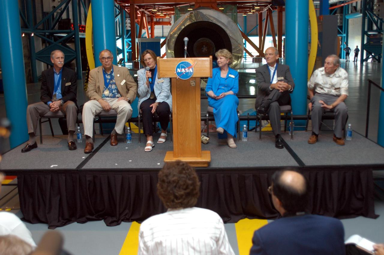 KENNEDY SPACE CENTER, FLA. --  Kathryn D. Sullivan, the first American woman to walk in space, responds to a reporter’s question at a press conference in the Apollo/Saturn V Center following the induction ceremony of five space program heroes into the Astronaut Hall of Fame.  Seated (left to right) with her are Richard O. Covey, commander of the Hubble Space Telescope repair mission; Frederick D. Gregory (second from left), the first African-American to command a space mission and the current NASA deputy administrator; Sullivan; June Scobee, representing her late husband Francis R. "Dick" Scobee, commander of the ill-fated 1986 Challenger mission; and Norman E. Thagard, the first American to occupy Russia’s Mir space station. The U.S. Astronaut Hall of Fame opened in 1990 to provide a place where space travelers could be remembered for their participation and accomplishments in the U.S. space program. To be eligible for induction, an individual must have been a U.S. citizen, a NASA astronaut, and out of the active astronaut corps at least five years. The five inductees join 52 previously honored astronauts from the ranks of the Gemini, Apollo, Skylab, Apollo-Soyuz, and Space Shuttle programs.