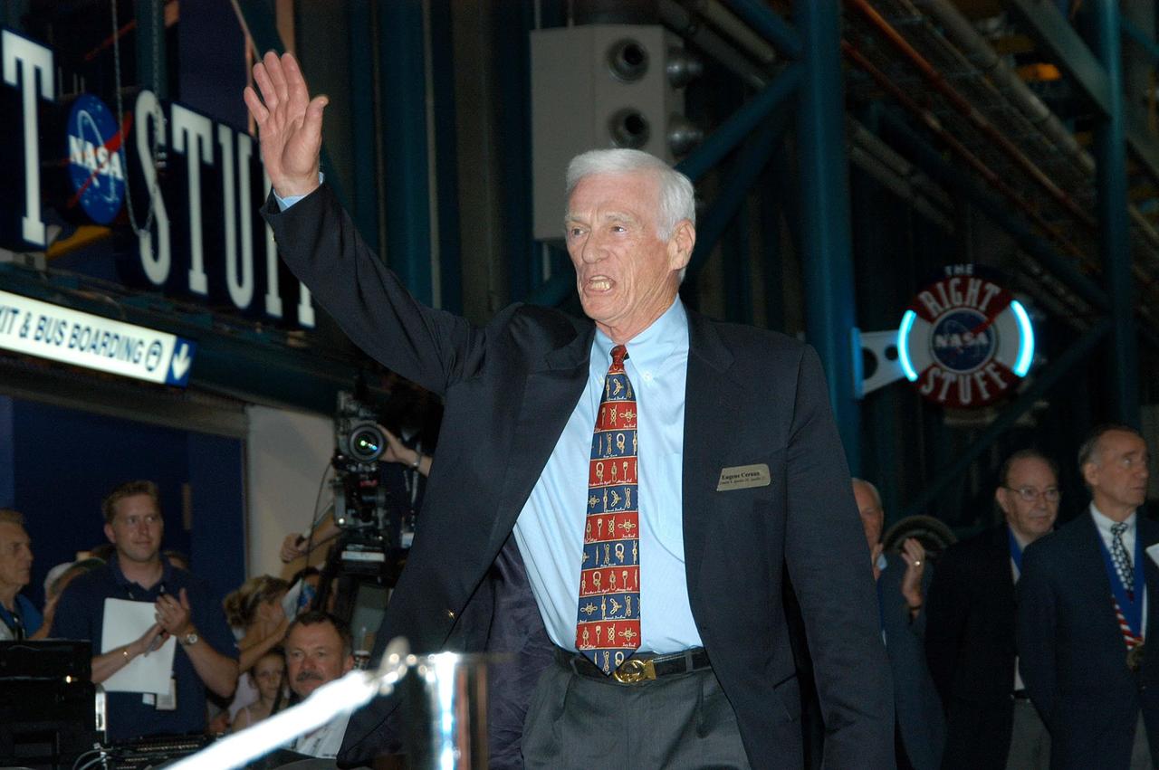 KENNEDY SPACE CENTER, FLA. --  Before the induction ceremony of five space program heroes into the U.S. Astronaut Hall of Fame, former astronaut Gene Cernan waves to guests as he is introduced as a previous inductee.  He walked in space on Gemini 9, orbited the Moon on Apollo 10 and walked on the Moon as commander of Apollo 17. The ceremony was held at the Apollo/Saturn V Center at KSC.  New inductees are Richard O. Covey, commander of the Hubble Space Telescope repair mission; Norman E. Thagard, the first American to occupy Russia’s Mir space station; the late Francis R. "Dick" Scobee, commander of the ill-fated 1986 Challenger mission; Kathryn D. Sullivan, the first American woman to walk in space; and Frederick D. Gregory, the first African-American to command a space mission and the current NASA deputy administrator. The U.S. Astronaut Hall of Fame opened in 1990 to provide a place where space travelers could be remembered for their participation and accomplishments in the U.S. space program. The five inductees join 52 previously honored astronauts from the ranks of the Gemini, Apollo, Skylab, Apollo-Soyuz, and Space Shuttle programs.