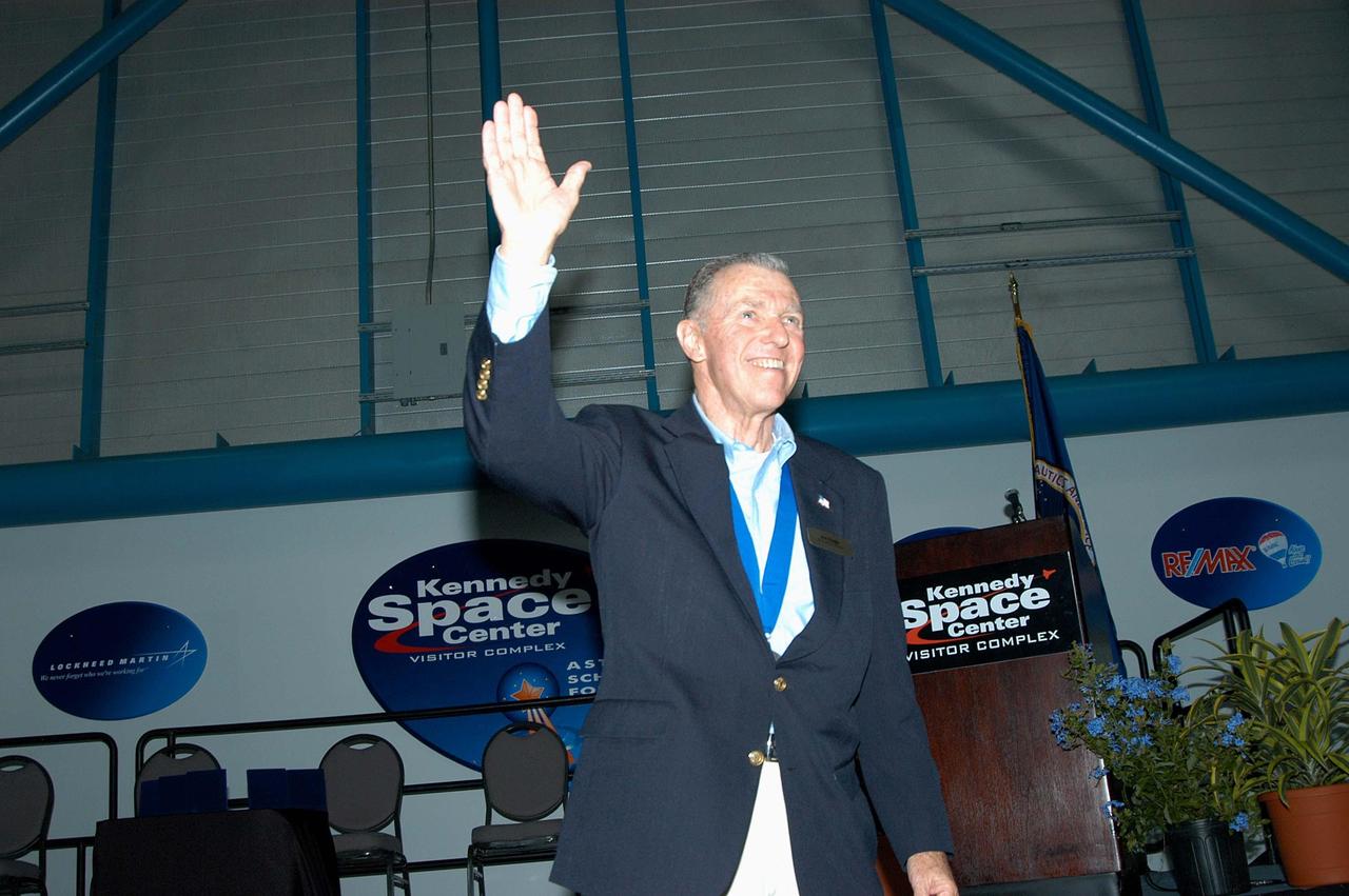 KENNEDY SPACE CENTER, FLA. -- Former astronaut Joe Engle acknowledges the applause as he is introduced as a previous inductee into the U.S. Astronaut Hall of Fame.  He and other  Hall of Fame members were present for the induction of five new space program heroes into the U.S. Astronaut Hall of Fame: Richard O. Covey, commander of the Hubble Space Telescope repair mission; Norman E. Thagard, the first American to occupy Russia’s Mir space station; the late Francis R. "Dick" Scobee, commander of the ill-fated 1986 Challenger mission; Kathryn D. Sullivan, the first American woman to walk in space; and Frederick D. Gregory, the first African-American to command a space mission and the current NASA deputy administrator. Engle made 16 flights in the X-15 rocket plane before he became a NASA astronaut and flew two Space Shuttle missions. In 1981, he commanded the second flight of Columbia, the first manned spacecraft to be reflown in space, and in 1985 he commanded a five-man crew on the 20th shuttle flight, a satellite-deploy and repair mission.  The induction ceremony was held at the Apollo/Saturn V Center at KSC.  The U.S. Astronaut Hall of Fame opened in 1990 to provide a place where space travelers could be remembered for their participation and accomplishments in the U.S. space program. The five inductees join 52 previously honored astronauts from the ranks of the Gemini, Apollo, Skylab, Apollo-Soyuz, and Space Shuttle programs.