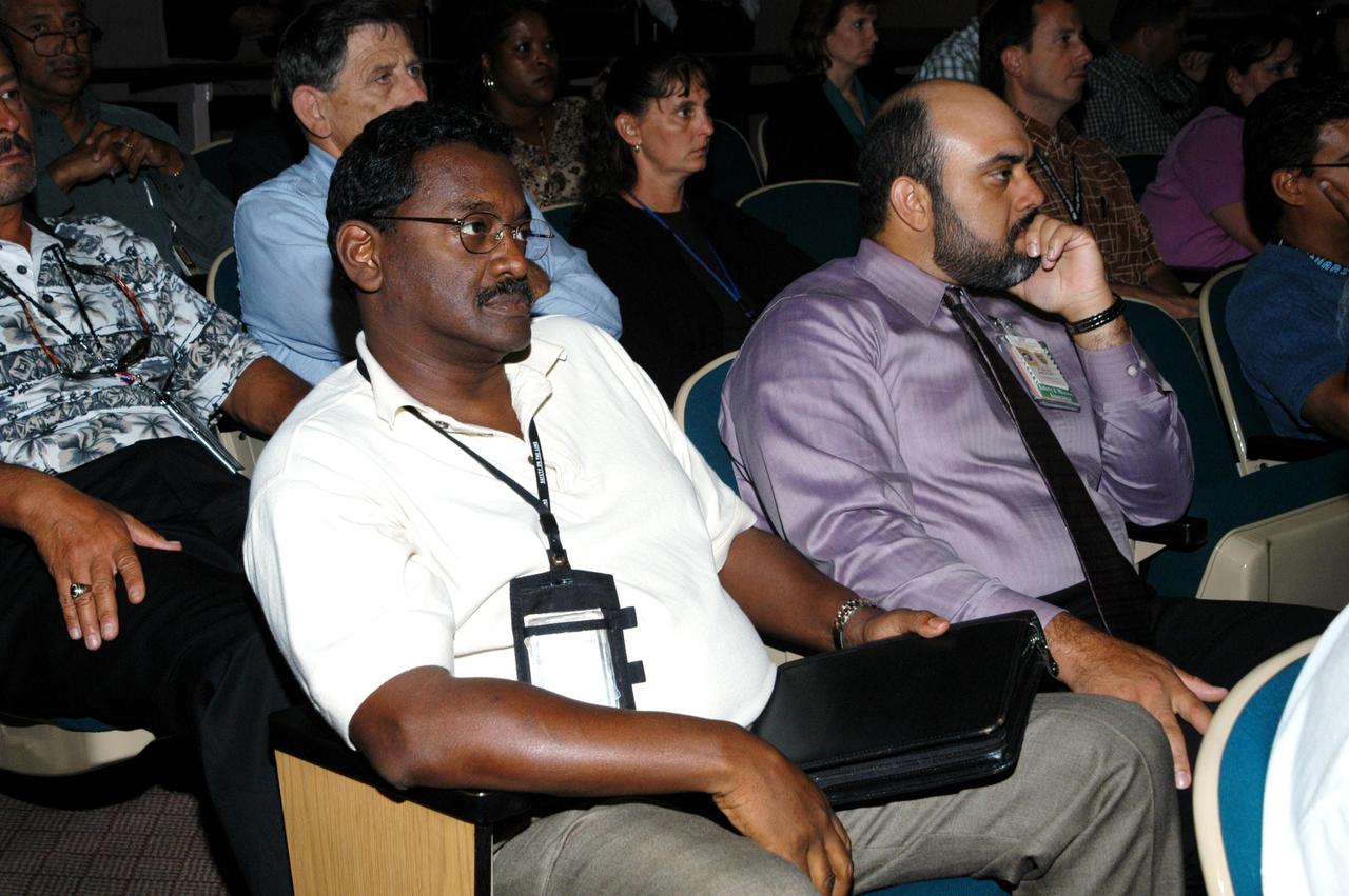 KENNEDY SPACE CENTER, FLA. -- KSC employees assemble in the Training Auditorium for a Culture Change Process All Hands Meeting. The purpose of the meeting was for employees to gain further insight into the Agency’s Vision for Space Exploration and the direction cultural change will take at KSC in order to assume its role within this vision. Panel members included James W. Kennedy, KSC director; Jim Jennings, Deputy Associate Administrator for Institutions and Asset Management; Lynn Cline, Deputy Associate Administrator for Space Flight; Bob Sieck, former Director of Space Shuttle Processing at KSC; and Jim Wetherbee, astronaut and Technical Assistant to the Director of Safety and Mission Assurance at the Johnson Space Center. Following their remarks, members of the panel entertained questions and comments from the audience.
