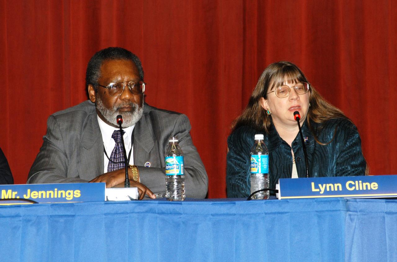 KENNEDY SPACE CENTER, FLA. -- Jim Jennings (left), Deputy Associate Administrator for Institutions and Asset Management, looks on as Lynn Cline, Deputy Associate Administrator for Space Flight, responds to a question asked by a member of the audience attending the Culture Change Process All Hands Meeting in the Training Auditorium. The purpose of the meeting was for employees to gain further insight into the Agency’s Vision for Space Exploration and the direction cultural change will take at KSC in order to assume its role within this vision. Other panel members were James W. Kennedy, KSC director; Bob Sieck, former Director of Space Shuttle Processing at KSC; and Jim Wetherbee, astronaut and Technical Assistant to the Director of Safety and Mission Assurance at Johnson Space Center.
