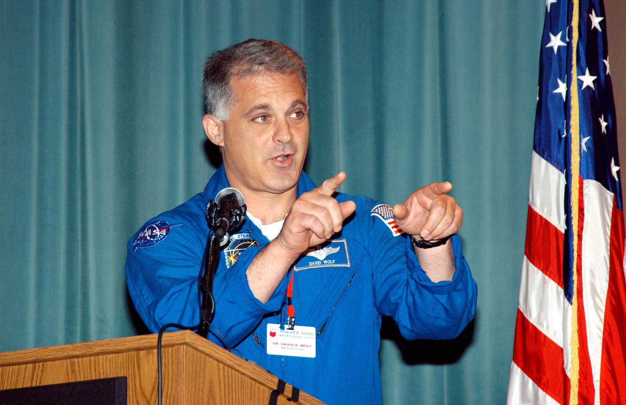 KENNEDY SPACE CENTER, FLA. -- Astronaut David Wolf addresses students and faculty of Howard A. Doolin Middle School, Miami, Fla., about his experiences in space. Doolin Middle School is one of 100 to take part in the NASA Explorer Schools (NES) program. Wolf joins Center Director Jim Kennedy on his visit to share America’s new vision for space exploration with the next generation of explorers. He is talking with students in Florida and Georgia Explorer Schools about our destiny as explorers, NASA’s stepping stone approach to exploring Earth, the Moon, Mars and beyond, how space impacts our lives, and how people and machines rely on each other in space.
