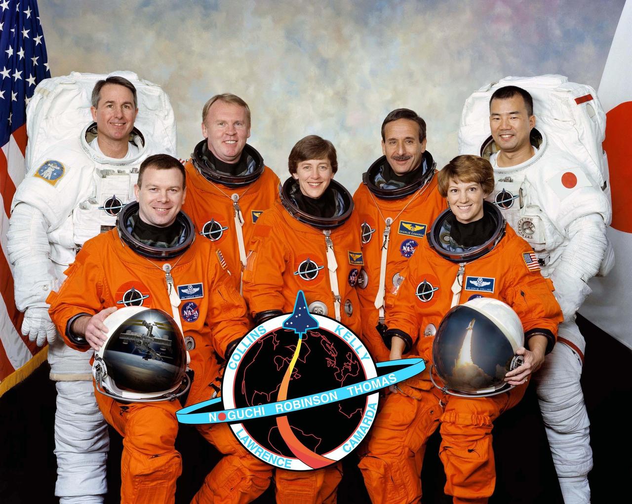 JOHNSON SPACE CENTER, HOUSTON, TEXAS  -  STS114-S-002-- These seven astronauts take a break from training to pose for the STS-114 crew portrait.  In front are astronauts Eileen M. Collins (right), commander; Wendy B. Lawrence (center), mission specialist; and James M. Kelly (left), pilot. In back (left to right) are astronauts Stephen K. Robinson, Andrew S. W. Thomas, Charles J. Camarda and Soichi Noguchi, all mission specialists. Noguchi represents Japan Aerospace Exploration Agency (JAXA).