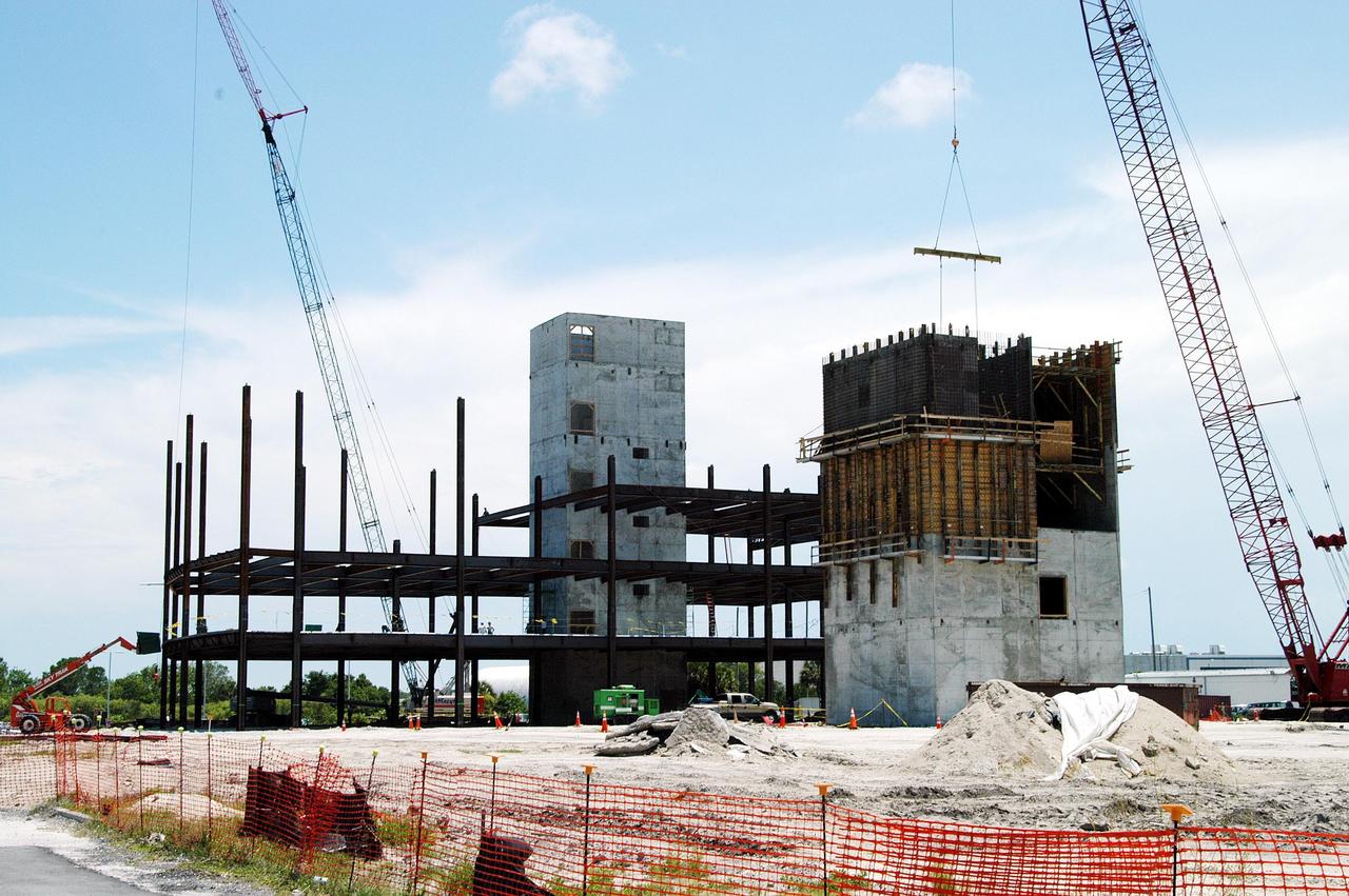 KENNEDY SPACE CENTER, FLA.  - Towers and girders are the current construction components on the Operations Support Building (OSB) II in the Launch Complex 39 Area.  The new building, which replaces modular housing constructed more than 20 years ago, will house NASA and contractor support staff for shuttle operations. The new structure is projected to be ready in April 2005.
