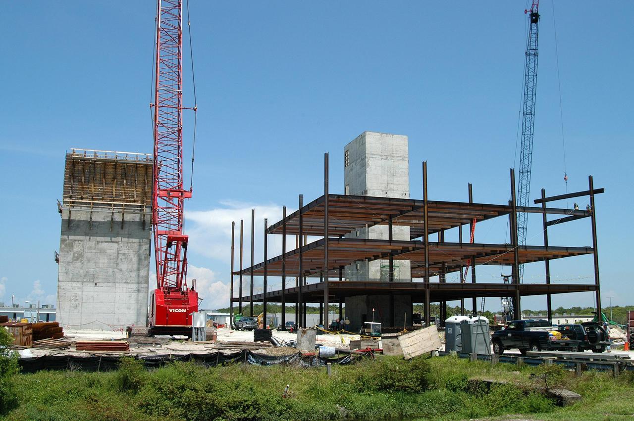 KENNEDY SPACE CENTER, FLA.  - Towers and girders are the current construction components on the Operations Support Building (OSB) II in the Launch Complex 39 Area.  The new building, which replaces modular housing constructed more than 20 years ago, will house NASA and contractor support staff for shuttle operations. The new structure is projected to be ready in April 2005.