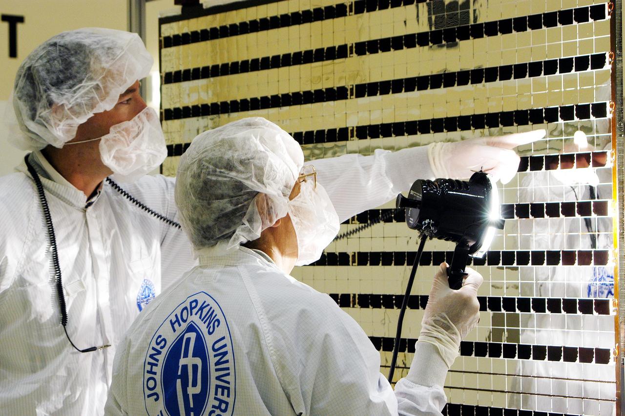 KENNEDY SPACE CENTER, FLA. - At Astrotech Space Operations in Titusville, Fla., the Mercury Surface, Space Environment, Geochemistry and Ranging (MESSENGER) spacecraft’s two solar arrays are undergoing cleaning inspections and voltage checks in preparation for installation on June 24 -25. One array will be installed each day, followed by a deployment test. The spacecraft will fly past Earth once, Venus twice and Mercury three times before starting a year-long orbital study of Mercury in March 2011. Launch is scheduled for July 30, 2004 from Pad 17-B at Cape Canaveral Air Force Station. MESSENGER was built for NASA by the Johns Hopkins University Applied Physics Laboratory in Laurel, Md.