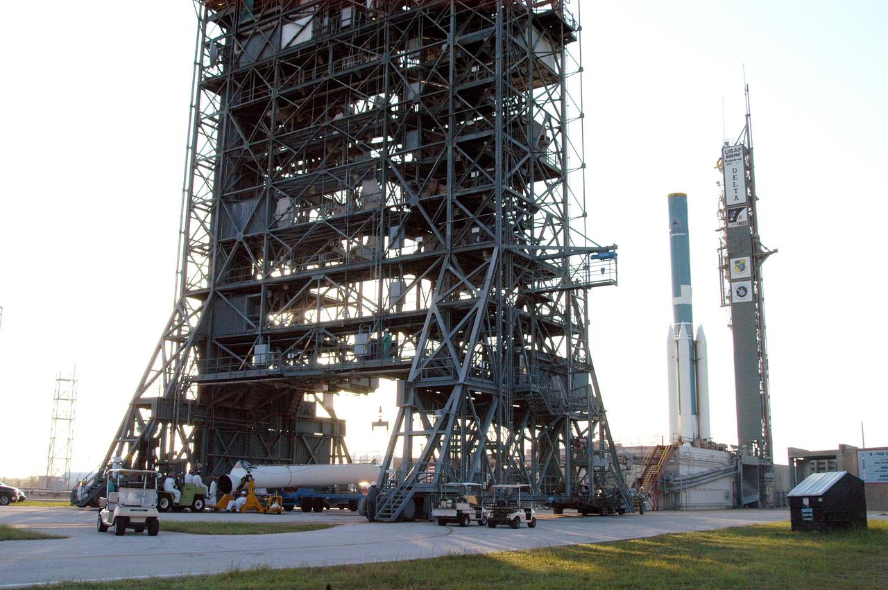 KENNEDY SPACE CENTER, FLA. -  The final Solid Rocket Boosters (SRBs) arrive at Pad 17-B, Cape Canaveral Air Force Station, for mating with the Boeing Delta II Heavy rocket that will launch the MESSENGER (Mercury Surface, Space Environment, Geochemistry and Ranging) spacecraft.   Scheduled to lift off Aug. 2, bound for Mercury, the spacecraft is expected to reach orbit around Mercury in March 2011.  MESSENGER was built for NASA by the Johns Hopkins University Applied Physics Laboratory in Laurel, Md.