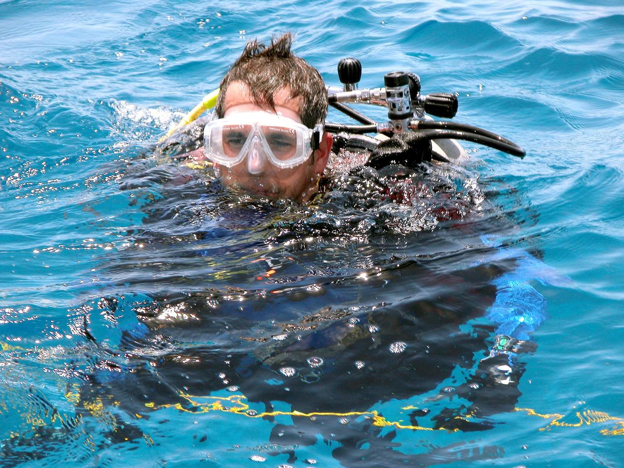 KENNEDY SPACE CENTER, FLA. - In the water for a practice dive in the ocean offshore from Key Largo is astronaut John Herrington.  He is commander of the NASA Extreme Environment Mission Operations 6 (NEEMO-6) mission team.  The others are Nick Patrick, Doug Wheelock, and Tara Ruttley, a biomedical engineer.  The NEEMO-6 mission involves exposing an astronaut/scientist crew to a real mission experience in an extreme environment - the NOAA undersea station Aquarius - to prepare for future space flight.  Spacewalk-like diving excursions and field-tests on a variety of biomedical equipment are designed to help astronauts living aboard the International Space Station.  To prepare for their 10-day stay, the team had dive training twice a day at the Life Support Buoy, anchored above Aquarius.