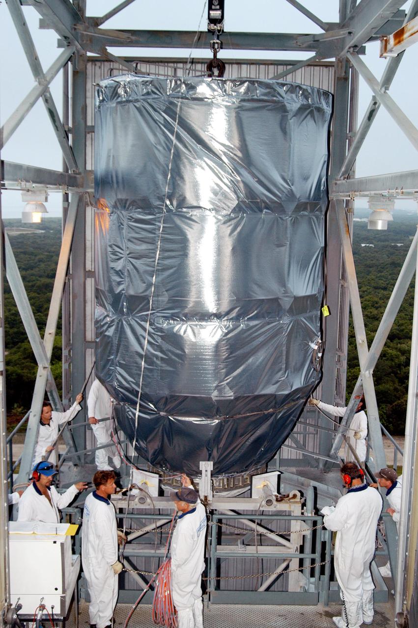 KENNEDY SPACE CENTER, FLA. -  On Launch Pad 17-B at Cape Canaveral Air Force Station, the MESSENGER spacecraft is viewed from inside the mobile service tower as it arrives at the top, where it will be mated to the Boeing Delta II Heavy rocket.  Liftoff is scheduled for Aug. 2.  The spacecraft is expected to reach orbit around the planet in March 2011.  MESSENGER was built for NASA by the Johns Hopkins University Applied Physics Laboratory in Laurel, Md.