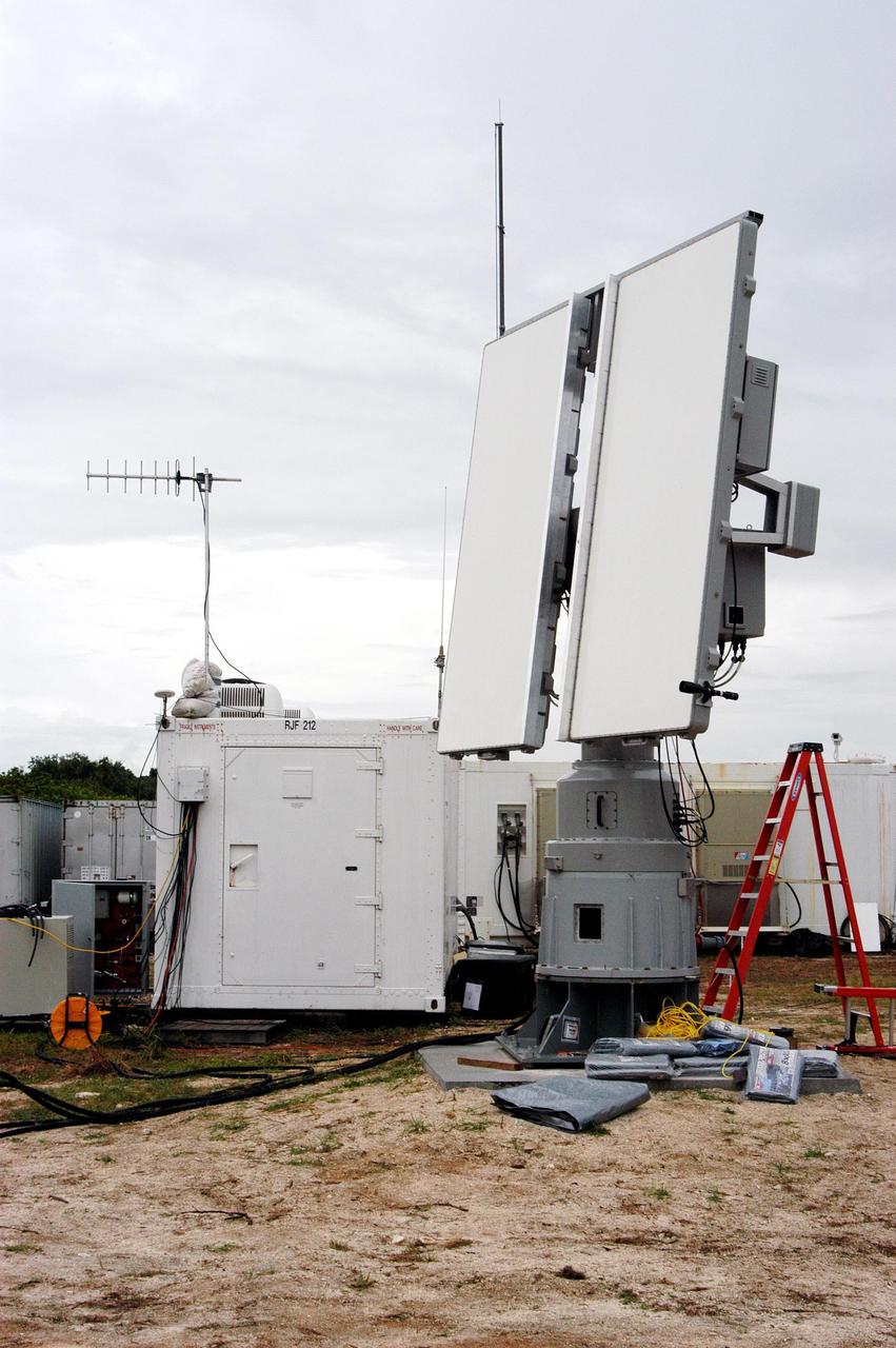 KENNEDY SPACE CENTER, FLA. - An X-band radar antenna is prepared to observe the MESSENGER (Mercury Surface, Space Environment, Geochemistry and Ranging) launch.  This antenna and a C-band radar antenna are on loan to KSC from the USNS Pathfinder, a U.S. Navy instrumentation ship.  They have been installed at  site north of Haulover Canal where the National Center for Atmospheric Research previously had a radar for thunderstorm research.  NASA is evaluating the pair of radars for their ability to observe possible debris coming from the Space Shuttle during launch, part of NASA’s initiative to return the Space Shuttle to flight.