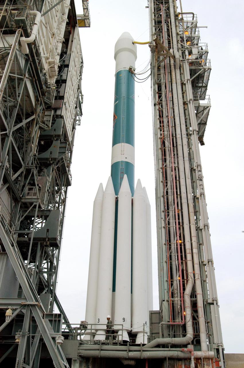 KENNEDY SPACE CENTER, FLA. - On Launch Pad 17-B, Cape Canaveral Air Force Station, the mobile service tower begins rolling back from the Boeing Delta II rocket with the Mercury Surface, Space Environment, Geochemistry and Ranging (MESSENGER) spacecraft aboard. This is the second launch attempt in two days after the first attempt Aug. 2 was postponed due to lightning potential from residual clouds that were associated with Tropical Storm Alex. The launch of MESSENGER on a seven-year journey to the planet Mercury is rescheduled for this date at 2:15:56 a.m. EDT at the opening of a 12-second launch window. MESSENGER will fly by Earth, Venus and Mercury several times to burn off energy before making its final approach to the inner planet on March 18, 2011. MESSENGER was built for NASA by the Johns Hopkins University Applied Physics Laboratory in Laurel, Md.