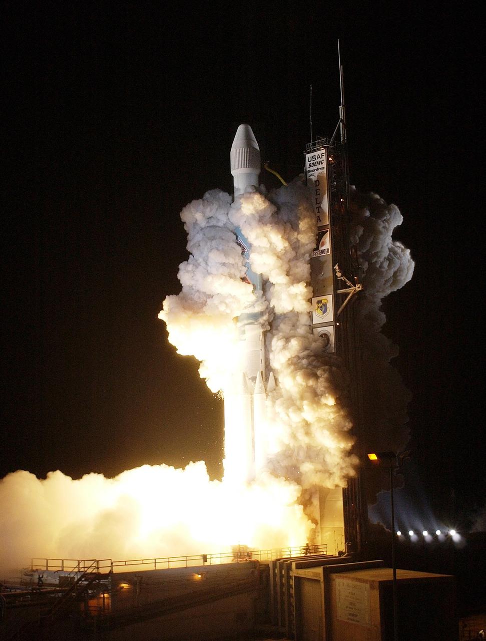 KENNEDY SPACE CENTER, FLA. - Wrapped in clouds of smoke, the Boeing Delta II rocket with its MESSENGER spacecraft on top climbs free as it lifts off on time at 2:15:56 a.m. EDT from Launch Pad 17-B, Cape Canaveral Air Force Station. MESSENGER (Mercury Surface, Space Environment, Geochemistry and Ranging) is on a seven-year, 4.9-billion-mile journey to the planet Mercury. The spacecraft will fly by Earth, Venus and Mercury several times, as well as circling the sun 15 times, to burn off energy before making its final approach to the inner planet on March 18, 2011. MESSENGER was built for NASA by the Johns Hopkins University Applied Physics Laboratory in Laurel, Md.