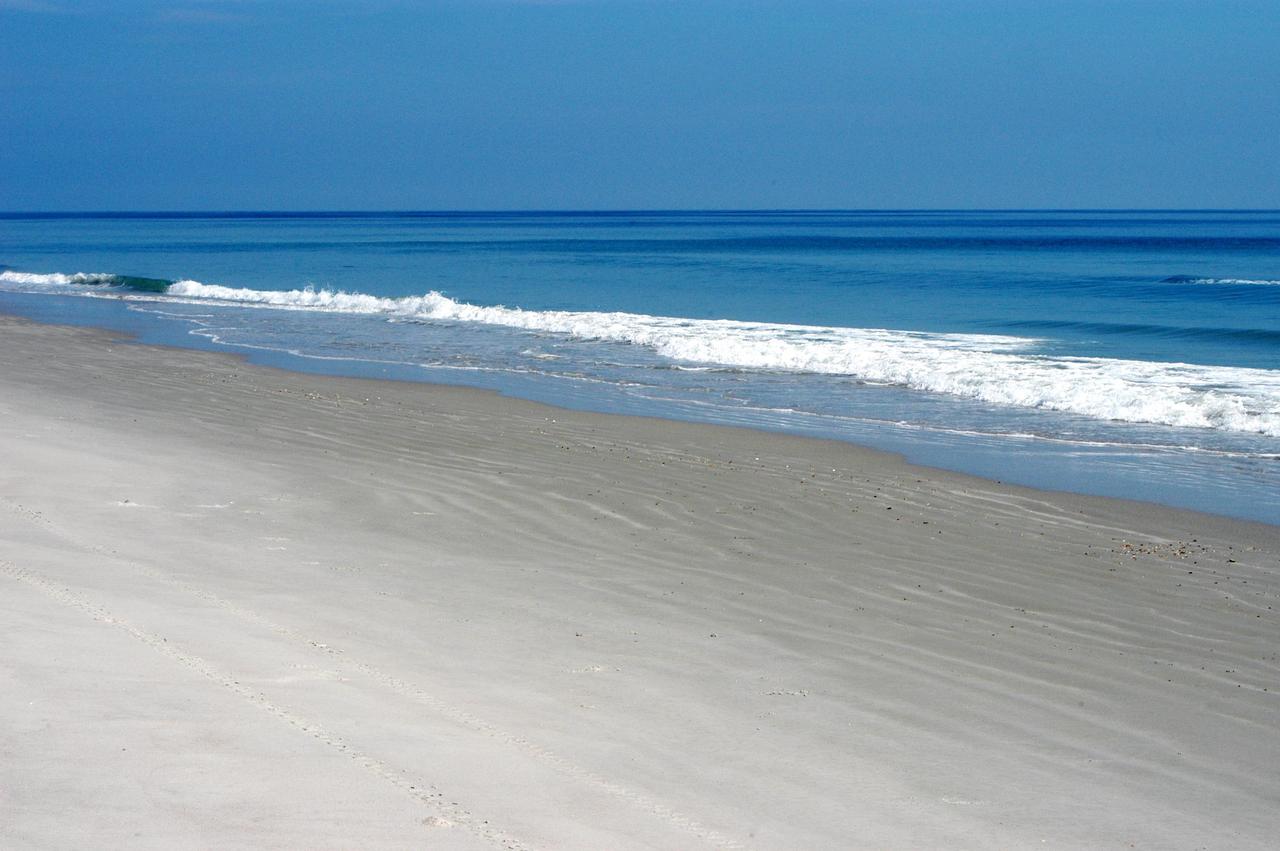 KENNEDY SPACE CENTER, FLA. - These pristine sand dunes near the launch pads at KSC are gently washed by the calm blue Atlantic Ocean.  The beach is part of the Canaveral National Seashore, managed by the National Wildlife Service.