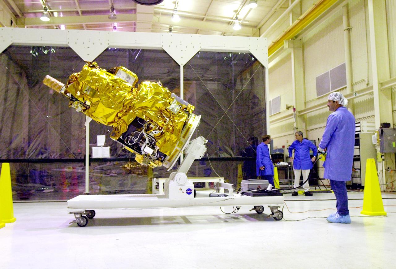KENNEDY SPACE CENTER, FLA. - At Vandenberg Air Force Base in California, the Demonstration of Autonomous Rendezvous Technology (DART) spacecraft is raised to a vertical position. It will be lifted onto a test stand for launch processing activities. The spacecraft was developed for NASA by Orbital Sciences Corporation in Dulles, Va., to prove technologies for locating and maneuvering near an orbiting satellite. DART will be launched on a Pegasus launch vehicle. At about 40,000 feet over the Pacific Ocean, the Pegasus will be released from Orbital’s Stargazer L-1011 aircraft, fire its rocket motors and boost DART into a polar orbit approximately 472 miles by 479 miles. Once in orbit, DART will rendezvous with a target satellite, the Multiple Paths, Beyond-Line-of-Site Communications satellite, also built by Orbital Sciences. DART will then perform several close proximity operations, such as moving toward and away from the satellite using navigation data provided by onboard sensors. DART is scheduled for launch no earlier than Oct. 18.