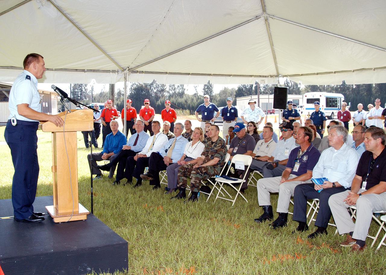 KENNEDY SPACE CENTER, FLA. - Brig. Gen. J. Gregory Pavlovich, 45th Space Wing, addresses guests at the ribbon cutting for the Enhanced Firing Range on Schwartz Rd. at Kennedy Space Center.  NASA’s Federal Law Enforcement Training Academy’s firing range has been upgraded to include a “rifle-grade” shoot house, a portable, tactical “shoot-back” trailer for cover and concealment drills, automated running targets and a new classroom facility.  They are added to the existing three firearms ranges, “pistol-grade” shoot house, obstacle course and rappel tower.   NASA’s Security Management and Safeguards Office funded the enhancements in order to improve ability to train the KSC security force and to support local, state and federal law enforcement agencies in Homeland Security.