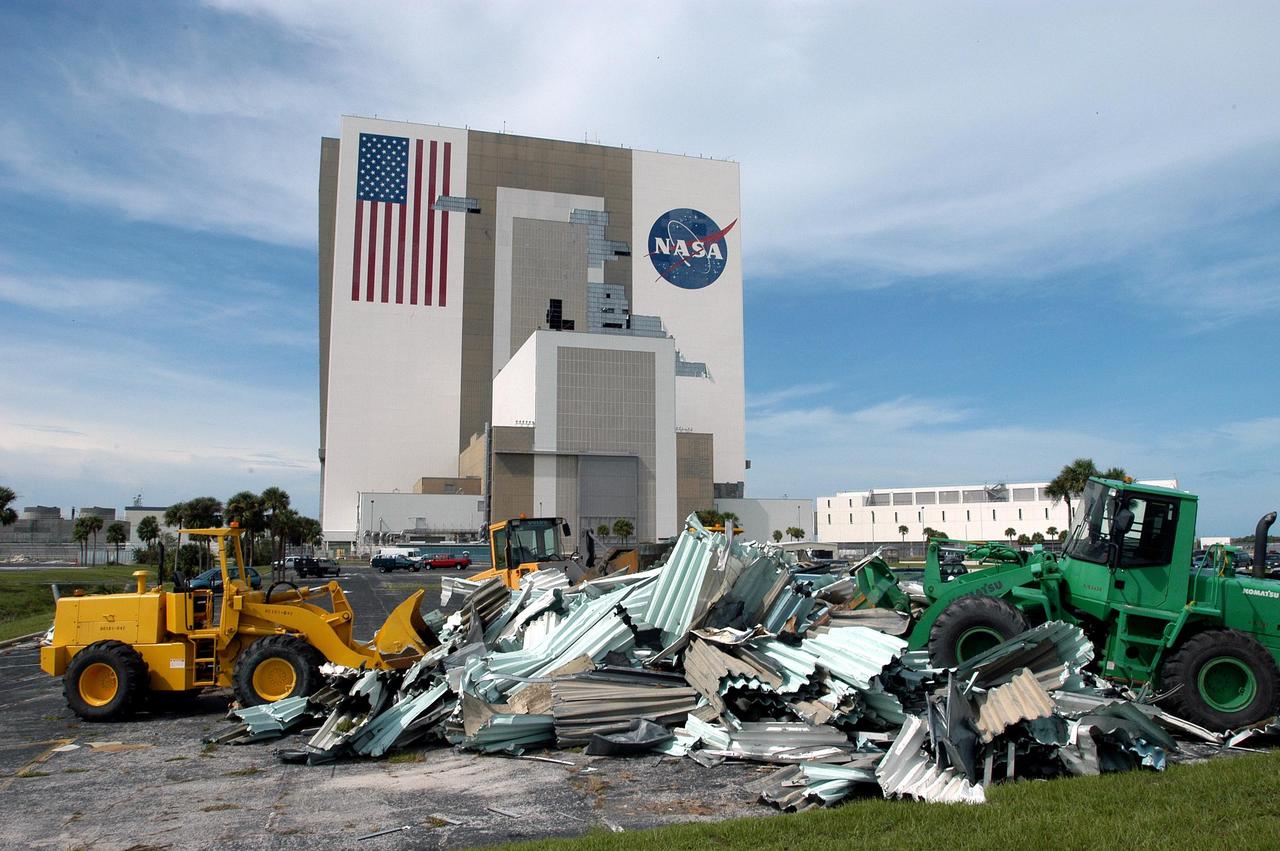 KENNEDY SPACE CENTER, FLA. -  Panels from the exterior walls of the Vehicle Assembly Building (VAB) are recovered during clean-up activities following Hurricane Frances. The storm's path over Florida took it through Cape Canaveral and KSC property during Labor Day weekend. Located in the heart of Launch Complex 39, the VAB is used for the integration and stacking of Space Shuttle elements and for the checkout and storage of Space Shuttle External Tanks.
