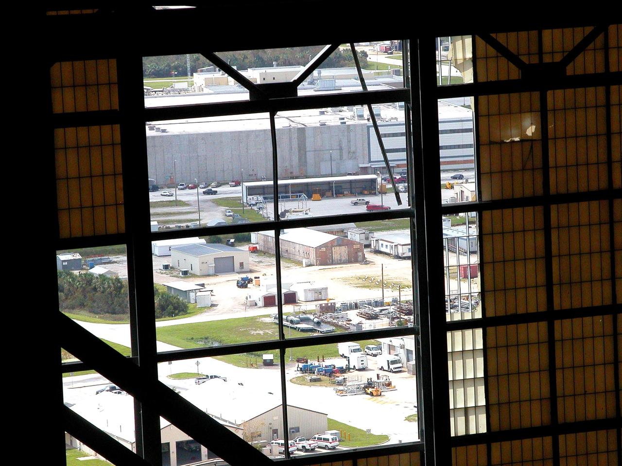 KENNEDY SPACE CENTER, FLA. -  Launch Complex 39 facilities are now visible through the openings left by missing panels from the exterior walls of the Vehicle Assembly Building (VAB)following Hurricane Frances. The storm's path over Florida took it through Cape Canaveral and KSC property during Labor Day weekend. Located in the heart of Launch Complex 39, the VAB is used for the integration and stacking of Space Shuttle elements and for the checkout and storage of Space Shuttle External Tanks.