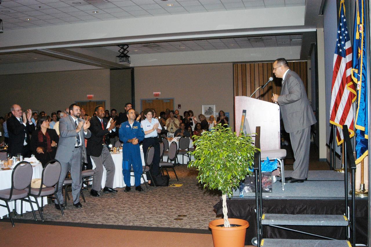 KENNEDY SPACE CENTER, FLA. - Guest speaker Charles A. Gambaro, NASA KSC engineering lead and Combat Engineering Group commander, speaks to an appreciative audience during KSC’s annual Hispanic American Heritage luncheon.  The theme was “Hispanic Americans Making a Difference.”  Gambaro recently returned from Operation Iraqi Freedom.  Hosted by the Hispanic Employment Program Working Group, the luncheon also provided live cultural entertainment.  The annual event helps employees reflect on the extensive contributions Hispanics have made to KSC, NASA and the nation.