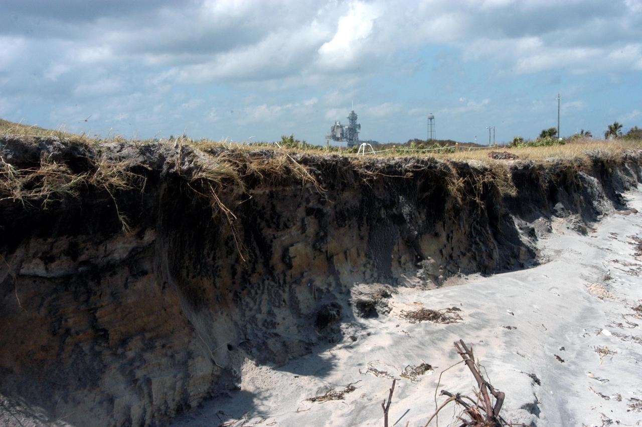 KENNEDY SPACE CENTER, FLA. - This view of the shoreline east of the launch pads at KSC shows the ocean lapping at the base of what appears to be a cliff.  The storm surge and raging winds from Hurricane Jeanne eroded the dunes and shoreline.  The category 3 storm barreled through Central Florida Sept. 25-26 from the southeast.  It was the fourth hurricane in 6 weeks to batter the state.