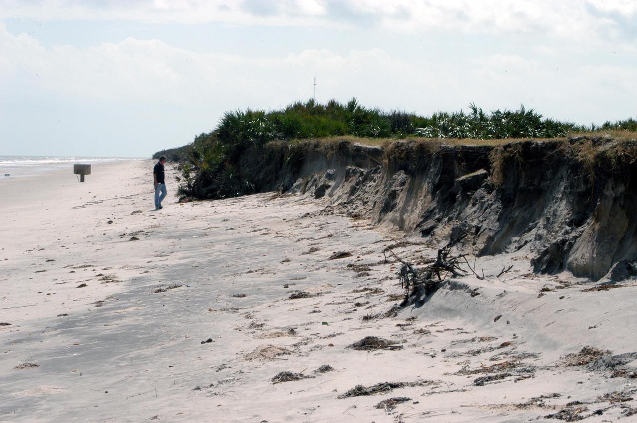 KENNEDY SPACE CENTER, FLA. - The storm surge and high winds of Hurricane Jeanne have replaced the rolling sand dunes on the KSC shoreline with cliffs of sand, shown here.  A category 3 storm, Jeanne barreled through Central Florida Sept. 25-26,  the fourth hurricane in 6 weeks to batter the state.