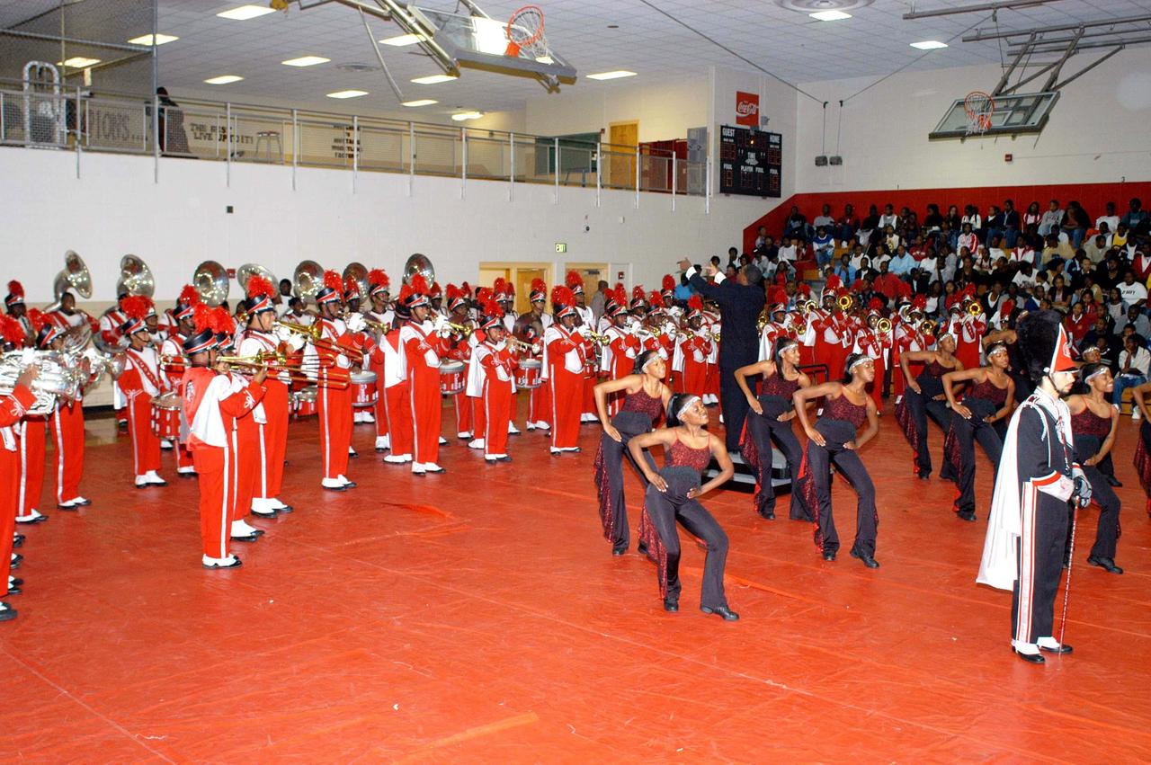KENNEDY SPACE CENTER, FLA. -  At Ronald E. McNair High School in Atlanta, a NASA Explorer School, the school band and dancers perform for  KSC Deputy Director Dr. Woodrow Whitlow Jr. and others, who are visiting to the school to share the vision for space exploration with the next generation of explorers.  Whitlow  is talking with students about our destiny as explorers, NASA’s stepping stone approach to exploring Earth, the Moon, Mars and beyond, how space impacts our lives, and how people and machines rely on each other in space.