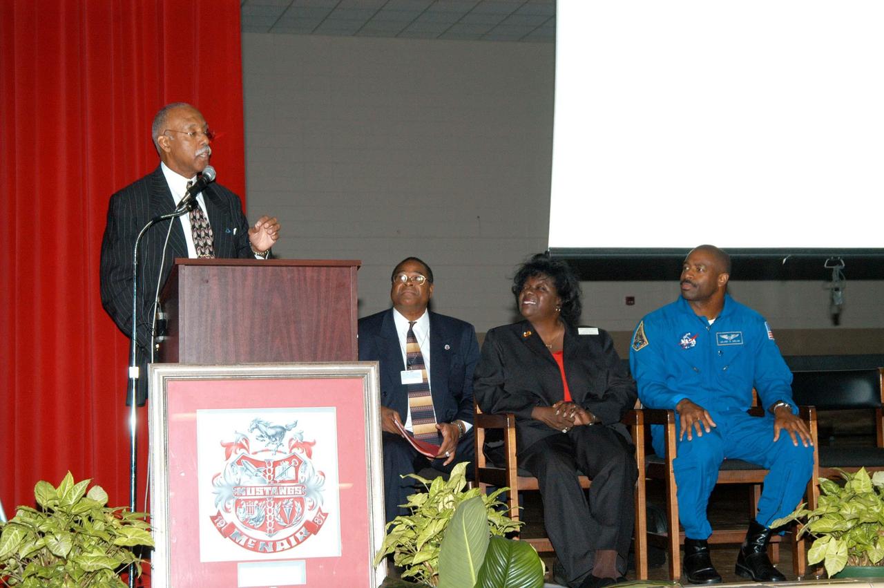 KENNEDY SPACE CENTER, FLA. - Dr. Julian Earls, director of the NASA Glenn Research Center, talks to students at Ronald E. McNair High School in Atlanta, a NASA Explorer School. He accompanied KSC Deputy Director Dr. Woodrow Whitlow Jr., who is visiting to the school to share the vision for space exploration with the next generation of explorers. Dr. Earls discussed the future and the vision for space, plus the NASA careers needed to meet the vision. Astronaut Leland Melvin (far right) accompanied Whitlow, talking with students about the importance of teamwork and what it takes for mission success. Whitlow talked with students about our destiny as explorers, NASA’s stepping stone approach to exploring Earth, the Moon, Mars and beyond, how space impacts our lives, and how people and machines rely on each other in space.