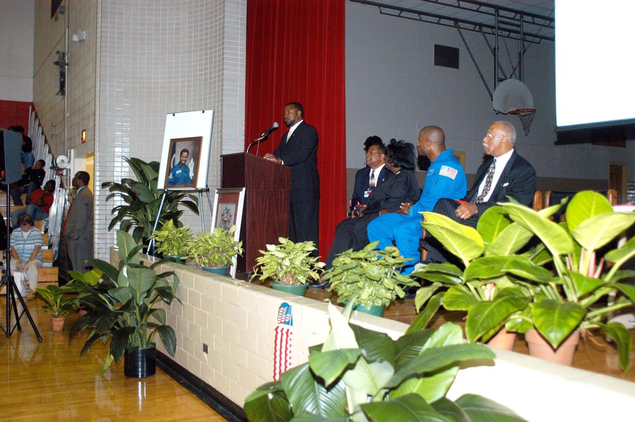 KENNEDY SPACE CENTER, FLA. - KSC Deputy Director Dr. Woodrow Whitlow Jr. talks to students at Ronald E. McNair High School in Atlanta, a NASA Explorer School. He is visiting to the school to share the vision for space exploration with the next generation of explorers. Astronaut Leland Melvin(second from right) accompanied Whitlow, talking with students about the importance of teamwork and what it takes for mission success. Also on the visit was Dr. Julian Earls (far right), director of NASA Glenn Research Center, who discussed the future and the vision for space, plus the NASA careers needed to meet the vision. Whitlow talked with students about our destiny as explorers, NASA’s stepping stone approach to exploring Earth, the Moon, Mars and beyond, how space impacts our lives, and how people and machines rely on each other in space.