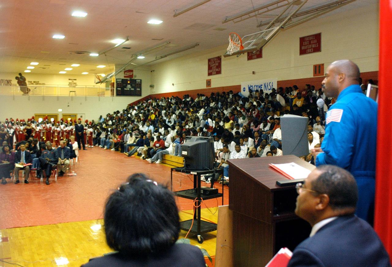 KENNEDY SPACE CENTER, FLA. - Astronaut Leland Melvin talks to students at Ronald E. McNair High School in Atlanta, a NASA Explorer School. He accompanied KSC Deputy Director Dr. Woodrow Whitlow Jr., who is visiting to the school to share the vision for space exploration with the next generation of explorers. He talked with students about our destiny as explorers, NASA’s stepping stone approach to exploring Earth, the Moon, Mars and beyond, how space impacts our lives, and how people and machines rely on each other in space. Melvin talked about the importance of teamwork and what it takes for mission success.