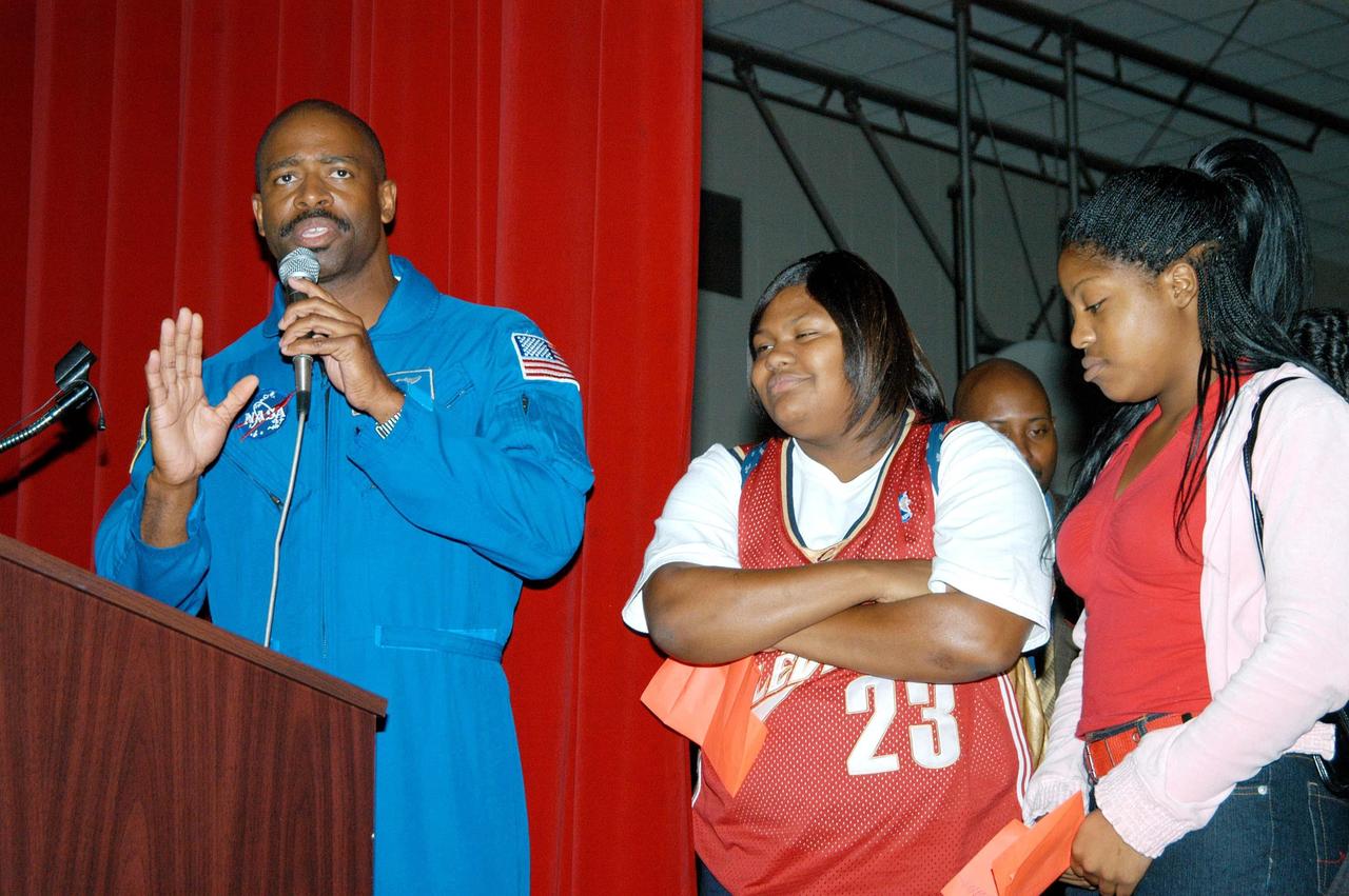 KENNEDY SPACE CENTER, FLA. - Astronaut Leland Melvin involves students at Ronald E. McNair High School in Atlanta, a NASA Explorer School, during a presentation. He accompanied KSC Deputy Director Dr. Woodrow Whitlow Jr., who is visiting to the school to share The vision for space exploration with the next generation of explorers. Whitlow talked with students about our destiny as explorers, NASA’s stepping stone approach to exploring Earth, the Moon, Mars and beyond, how space impacts our lives, and how people and machines rely on each other in space. Melvin talked about the importance of teamwork and what it takes for mission success.
