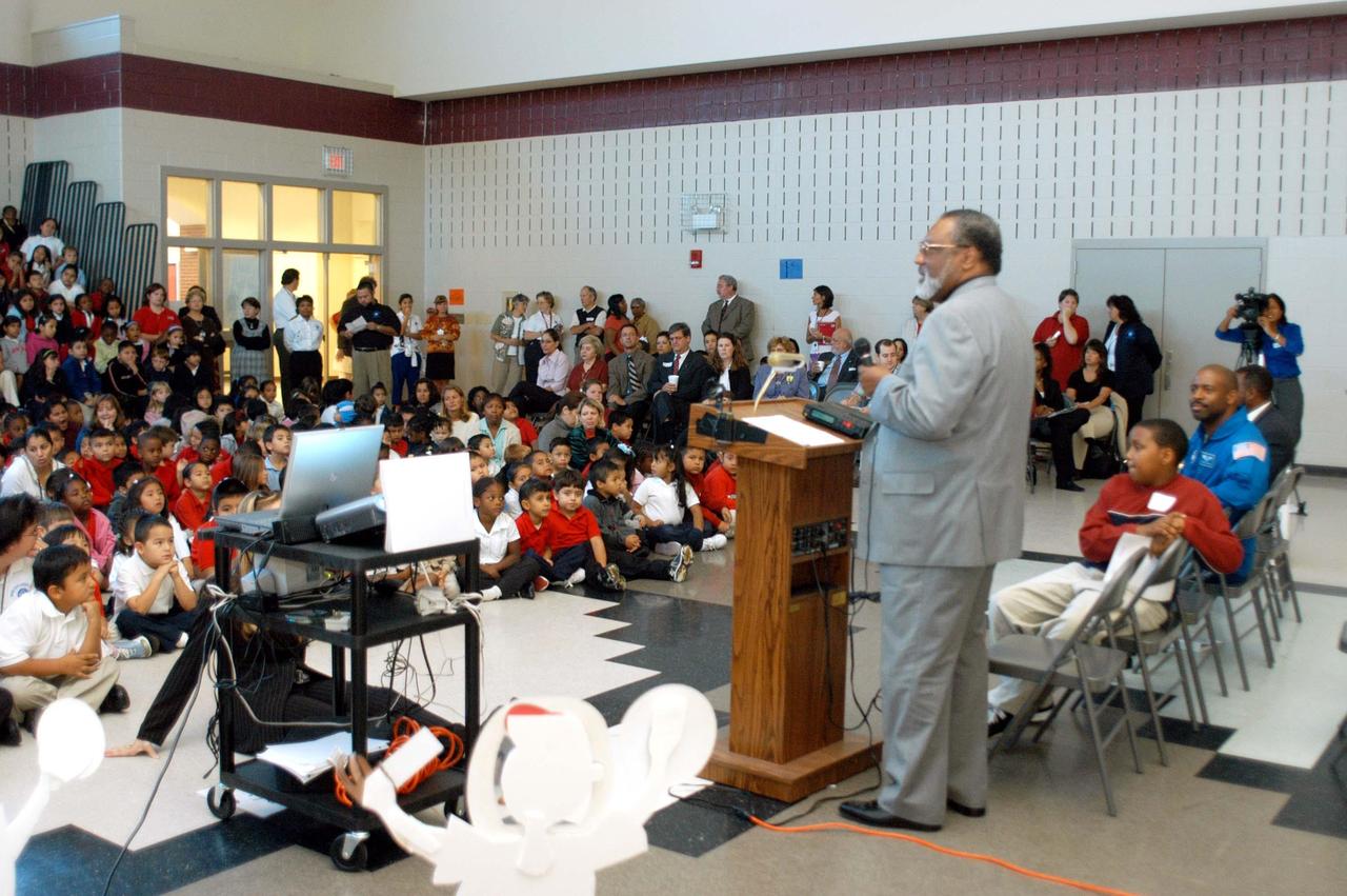 KENNEDY SPACE CENTER, FLA. -  Jim Jennings, deputy associate administrator for Institutions and Asset Management at NASA Headquarters, talks to students at Gainesville Elementary School, a NASA Explorer School in Gainesville, Ga.   Jennings visited the school to share the new vision for space exploration with the next generation of explorers.  Also visiting the school was astronaut Leland Melvin and KSC Deputy Director Dr. Woodrow Whitlow Jr., seated at right.  Whitlow talked with students about our destiny as explorers, NASA’s stepping stone approach to exploring Earth, the Moon, Mars and beyond, how space impacts our lives, and how people and machines rely on each other in space.