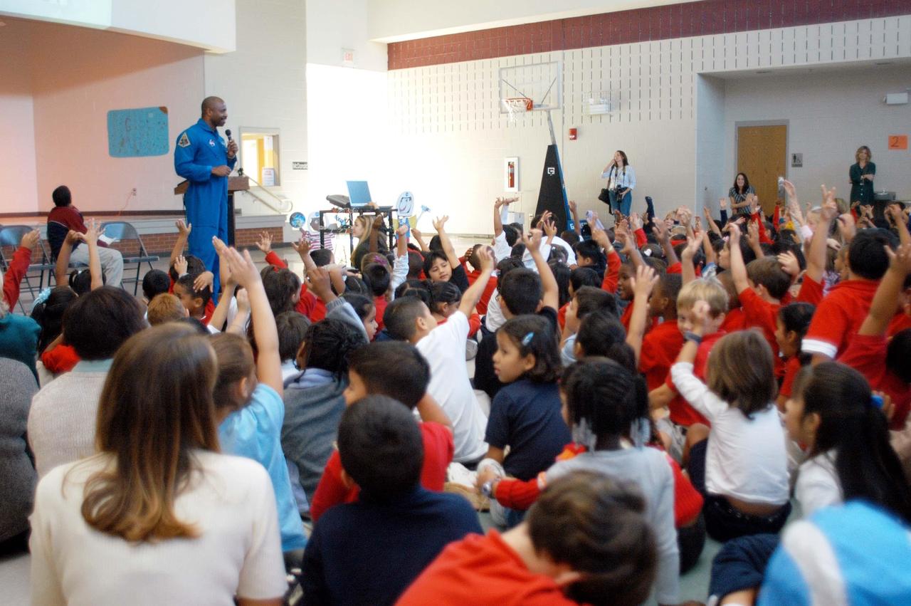 KENNEDY SPACE CENTER, FLA. - Astronaut Leland Melvin talks and interacts with students at Gainesville Elementary School, a NASA Explorer School in Gainesville, Ga. Melvin joined Jim Jennings, deputy associate administrator for Institutions and Asset Management at NASA Headquarters, on the visit to the school to share the new vision for space exploration with the next generation of explorers. Also accompanying Jennings was KSC Deputy Director Dr. Woodrow Whitlow Jr., who talked with students about our destiny as explorers, NASA’s stepping stone approach to exploring Earth, the Moon, Mars and beyond, how space impacts our lives, and how people and machines rely on each other in space. Melvin talked about the importance of teamwork and what it takes for mission success.