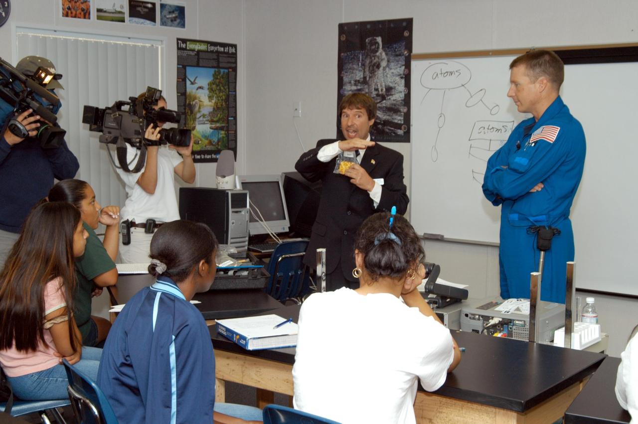 KENNEDY SPACE CENTER, FLA. -  Les Gold, Aerospace Education specialist with KSC, speaks to students at Immokalee Middle School in Naples, Fla.  At right is astronaut Terry Virts.  Gold and Virts accompanied Center Director Jim Kennedy for a presentation at the school to share the vision for space exploration with the next generation of explorers.  Immokalee is part of NASA’s Explorer School (NES) Program and is teamed with Pine Ridge Middle School.  Kennedy is talking with students about our destiny as explorers, NASA’s stepping stone approach to exploring Earth, the Moon, Mars and beyond, how space impacts our lives, and how people and machines rely on each other in space.  NES establishes a three-year partnership annually between NASA and 50 NASA Explorer Schools teams, consisting of teachers and education administrators from diverse communities nationwide.