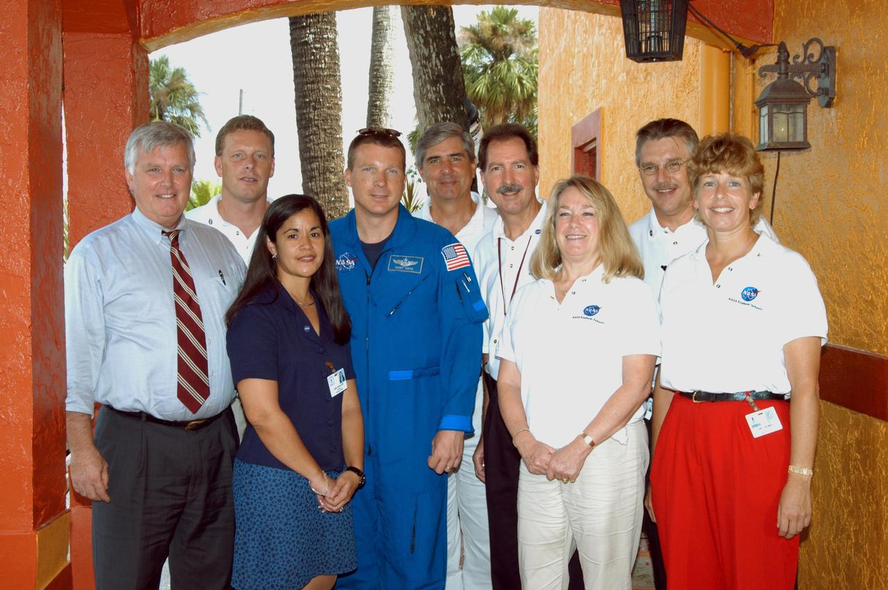 KENNEDY SPACE CENTER, FLA. -  While visiting Immokalee Middle School in Naples, Fla., Center Director Jim Kennedy (far left) and astronaut Terry Virts (fourth from left) pose for a photo with school staff members.  Second from left is the principal, Lisa Scallon.  Immokalee is part of NASA’s Explorer School (NES) Program and is teamed with Pine Ridge Middle School. Kennedy visited the school to share the vision for space exploration with the next generation of explorers. He is talking with students about our destiny as explorers, NASA’s stepping stone approach to exploring Earth, the Moon, Mars and beyond, how space impacts our lives, and how people and machines rely on each other in space.  NES establishes a three-year partnership annually between NASA and 50 NASA Explorer Schools teams, consisting of teachers and education administrators from diverse communities nationwide.