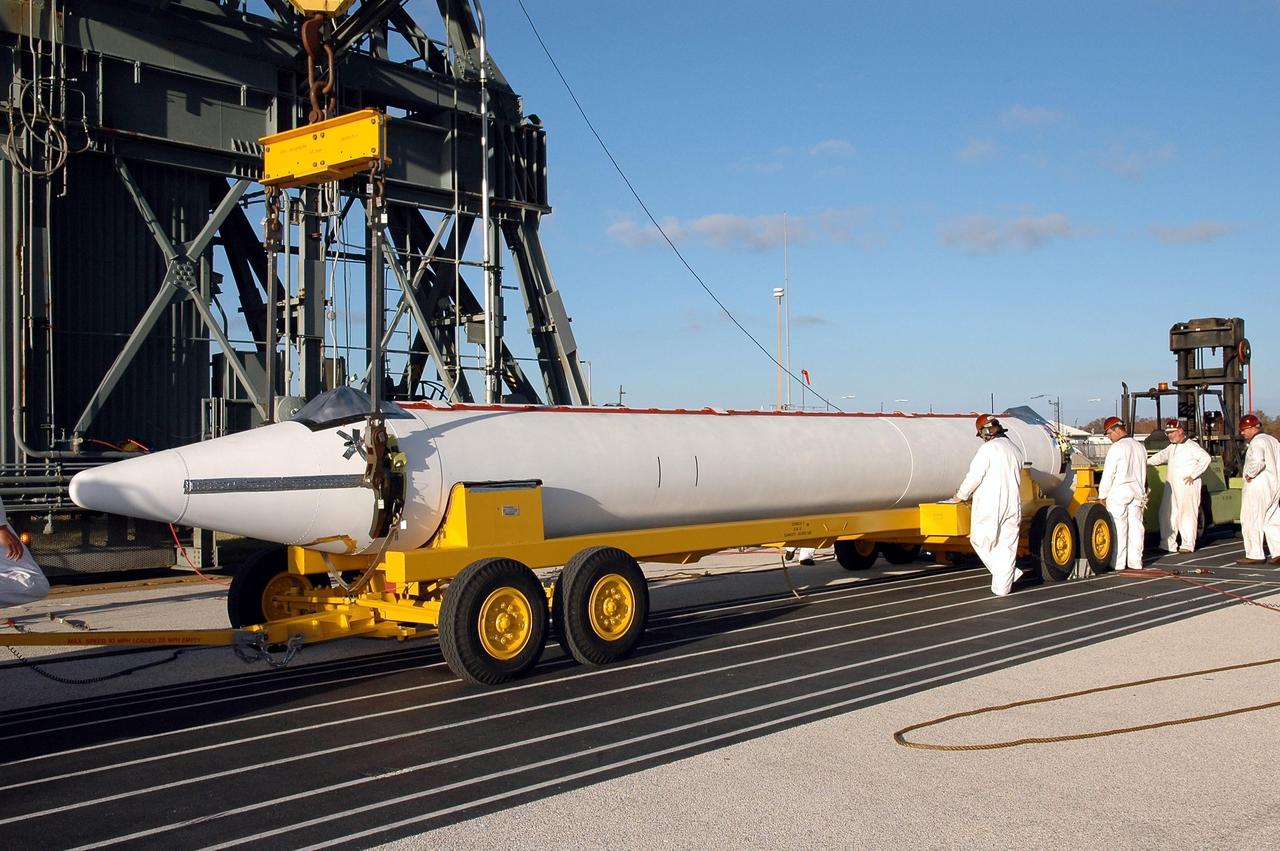 KENNEDY SPACE CENTER, FLA. - A Solid Rocket Booster for the Swift-Delta launch arrives at Pad 17-A at Cape Canaveral Air Force Station. The SRB is one of three to be attached to the Boeing Delta rocket that is the launch vehicle for the Swift spacecraft and its Gamma-Ray Burst Mission. Swift is a medium-class Explorer mission managed by NASA’s Goddard Space Flight Center in Greenbelt, Md.