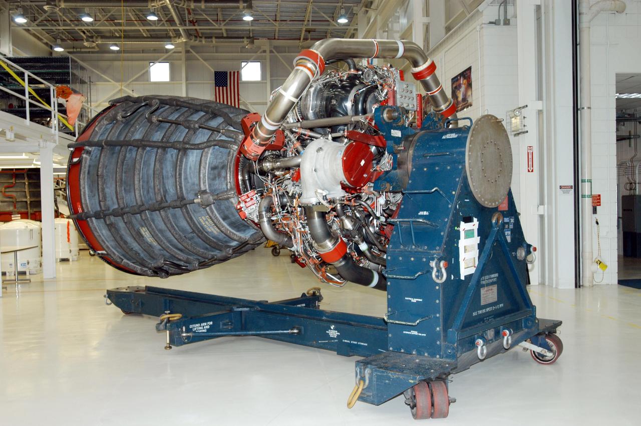 KENNEDY SPACE CENTER, FLA. -  Inside the KSC Engine Shop, the third Space Shuttle Main Engine for Discovery’s Return to Flight mission STS-114 is secure on a stand.  The engine has been returned from NASA’s Stennis Space Center in Mississippi where it underwent a hot fire acceptance test. Typically, the engines are installed on an orbiter in the Orbiter Processing Facility approximately five months before launch.