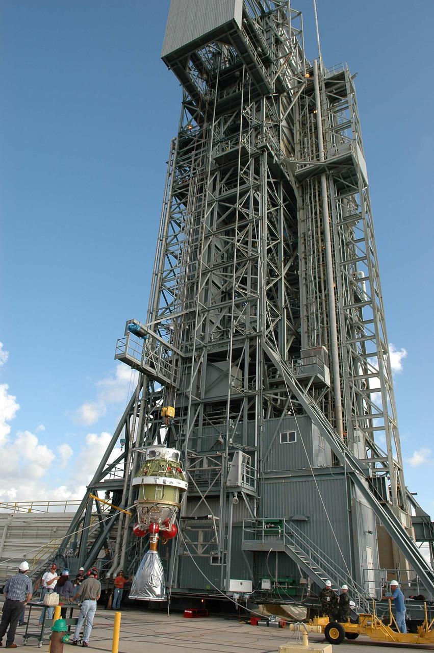 KENNEDY SPACE CENTER, FLA. - At Launch Pad 17-A on Cape Canaveral Air Force Station, the second stage of the Boeing Delta II launch vehicle is ready to be lifted up the mobile service tower for mating with the first stage. The rocket is the launch vehicle for the Swift spacecraft and its Gamma-Ray Burst Mission, now scheduled for liftoff Nov. 8. Swift is a medium-class Explorer mission managed by NASA’s Goddard Space Flight Center in Greenbelt, Md. It is a first-of-its-kind multi-wavelength observatory dedicated to the study of gamma-ray burst (GRB) science. Its three instruments will work together to observe GRBs and afterglows in the gamma ray, X-ray, ultraviolet and optical wavebands. KSC is responsible for Swift’s integration with the Boeing Delta II rocket and the countdown management on launch day.