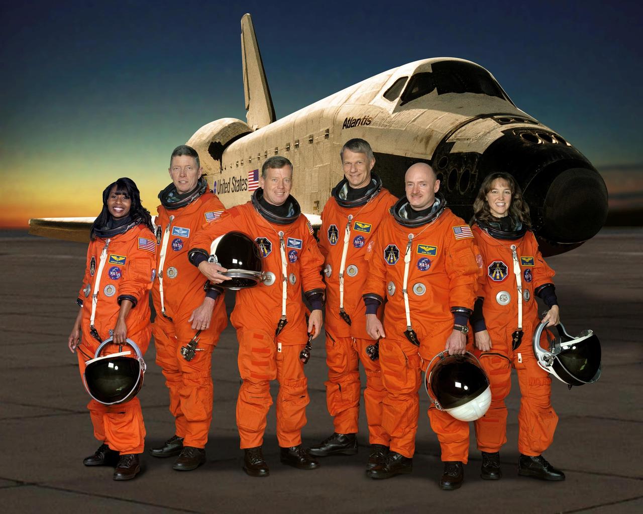 JOHNSON SPACE CENTER, TEXAS -- STS121-S-002 -- These six astronauts take a break from training to pose for the STS-121 crew portrait. From the left are astronauts Stephanie D. Wilson, Michael E. Fossum, both mission specialists; Steven W. Lindsey, commander; Piers J. Sellers, mission specialist; Mark E. Kelly, pilot; and Lisa M. Nowak, mission specialist.  Photo Credit: NASA/JSC