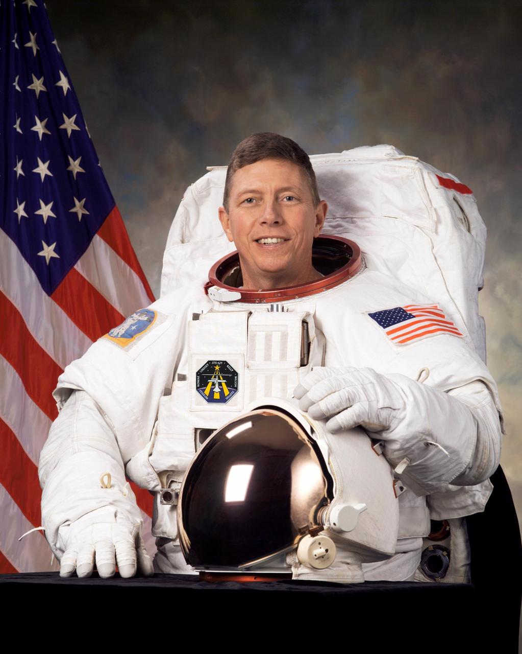 JOHNSON SPACE CENTER, TEXAS -- JSC2005-E-16260 -- Official portrait of astronaut Michael E. Fossum, mission specialist.
