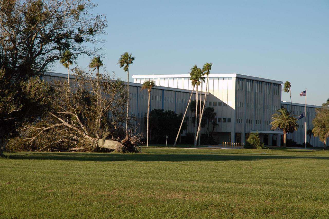 KENNEDY SPACE CENTER, FLA. -   A large tree lies on its side after being ripped from the ground near NASA Headquarters at Kennedy Space Center following the wrath of hurricane Wilma as it crossed the state Oct. 24.   Kennedy’s facilities sustained minor structural damage,  primarily to roofs or from water intrusion. The Vehicle Assembly Building lost some panels on the east and west sides. Some facilities lost power. A total of 13.6 inches of rain was recorded at the Shuttle Landing Facility. The highest wind gust recorded was 94 mph from the north-northwest at Launch Pad 39B, while the maximum sustained wind was 76 mph from the north-northwest at the top of the 492-foot weather tower located north of the Vehicle Assembly Building.