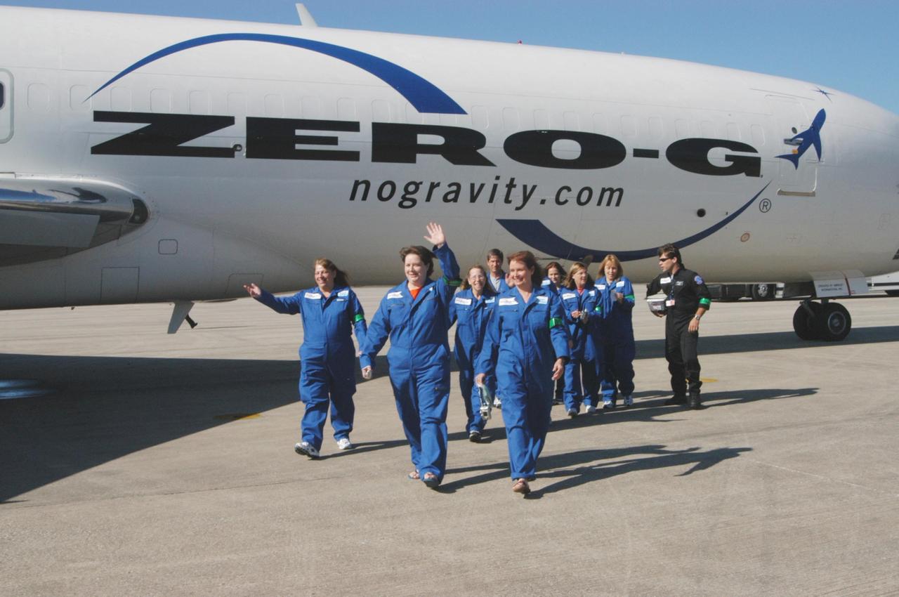 KENNEDY SPACE CENTER, FLA. -  The first group of passengers to fly on the ZERO-G aircraft are eager to get started.  The Boeing 727-200 aircraft is used for weightless flights by Zero Gravity Corporation, known as ZERO-G, of Fort Lauderdale, Fla.  NASA and ZERO-G demonstrated Nov. 5 the expanded access to and use of the space shuttle's runway and landing facility at Kennedy Space Center for non-NASA activities.  The passengers, called "Flyers," were predominantly teachers who performed simple microgravity experiments they can share with their students back in the classroom.