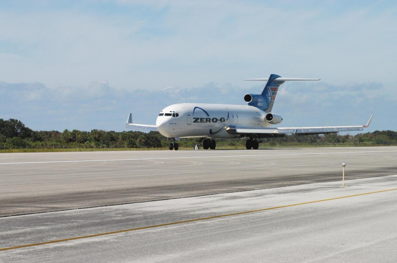 KENNEDY SPACE CENTER, FLA. -  The Boeing 727-200 aircraft used for weightless flights by Zero Gravity Corporation, known as ZERO-G, of Fort Lauderdale, Fla., lands after taking a group of passengers for demonstration.  NASA and ZERO-G demonstrated Nov. 5 the expanded access to and use of the space shuttle's runway and landing facility at Kennedy Space Center for non-NASA activities.  This group of passengers, called "Flyers," were predominantly teachers who performed simple microgravity experiments they can share with their students back in the classroom.