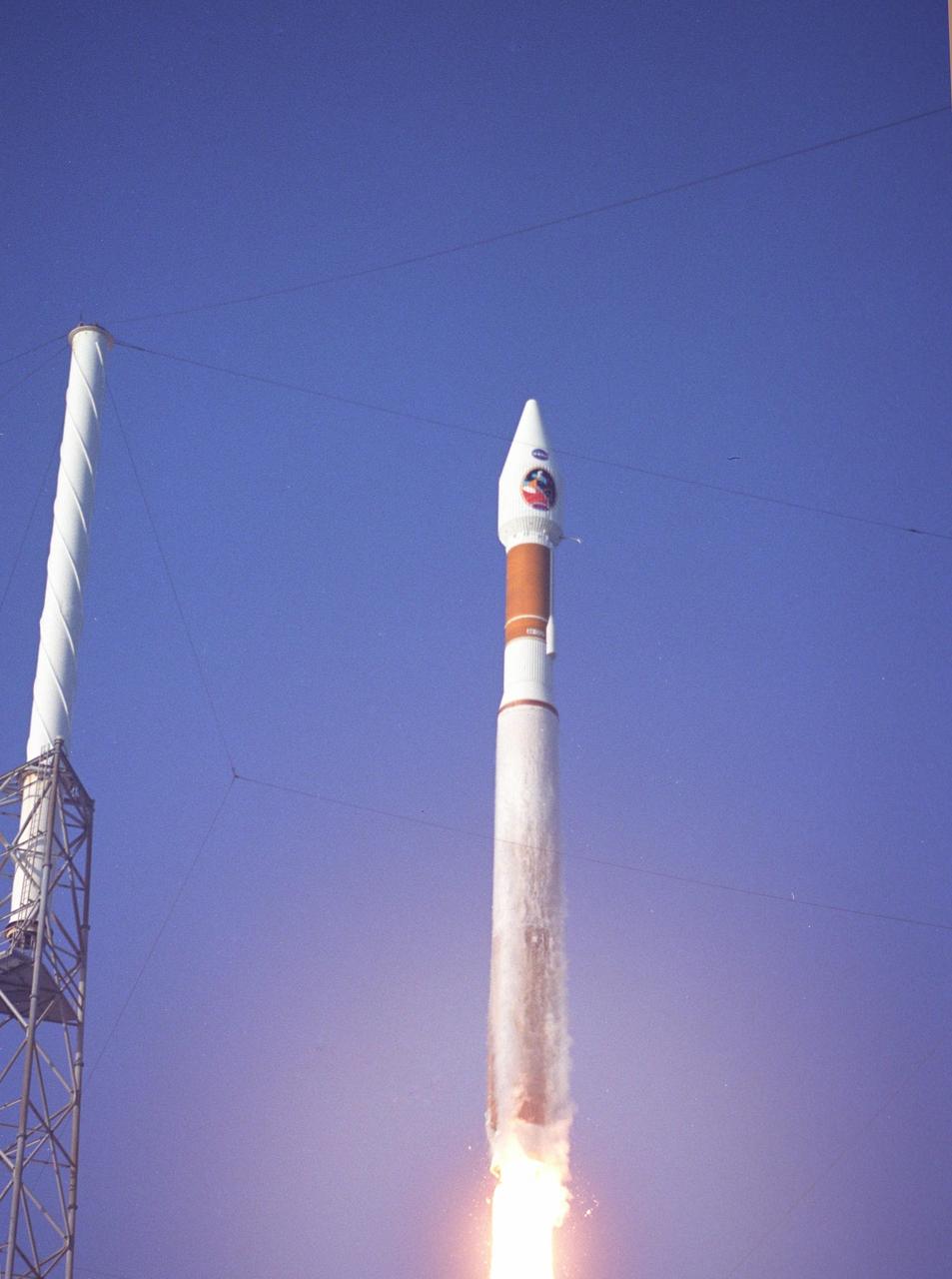 KENNEDY SPACE CENTER, FLA. -   Just minutes after liftoff, the 19-stories-tall Atlas V launch vehicle, with a two-ton Mars Reconnaissance Orbiter (MRO) on top, roars into the clear blue sky from Launch Complex 41 at Cape Canaveral Air Force Station.  Liftoff was at 7:43 a.m. EDT.  All systems performed nominally for NASA's first launch of an Atlas V on an interplanetary mission. MRO established radio contact with controllers 61 minutes after launch and within four minutes of separation from the upper stage. Initial contact came through an antenna at the Japan Aerospace Exploration Agency's Uchinoura Space Center in southern Japan.  Mars is 72 million miles from Earth today, but the spacecraft will travel more than four times that distance on its outbound-arc trajectory to intercept the red planet on March 10, 2006. The orbiter carries six scientific instruments for examining the surface, atmosphere and subsurface of Mars in unprecedented detail from low orbit.  NASA expects to get several times more data about Mars from MRO than from all previous Martian missions combined. Researchers will use the instruments to learn more about the history and distribution of Mars' water. That information will improve understanding of planetary climate change and will help guide the quest to answer whether Mars ever supported life. The orbiter will also evaluate potential landing sites for future missions. (Photo Credit:  Tom Rogers)