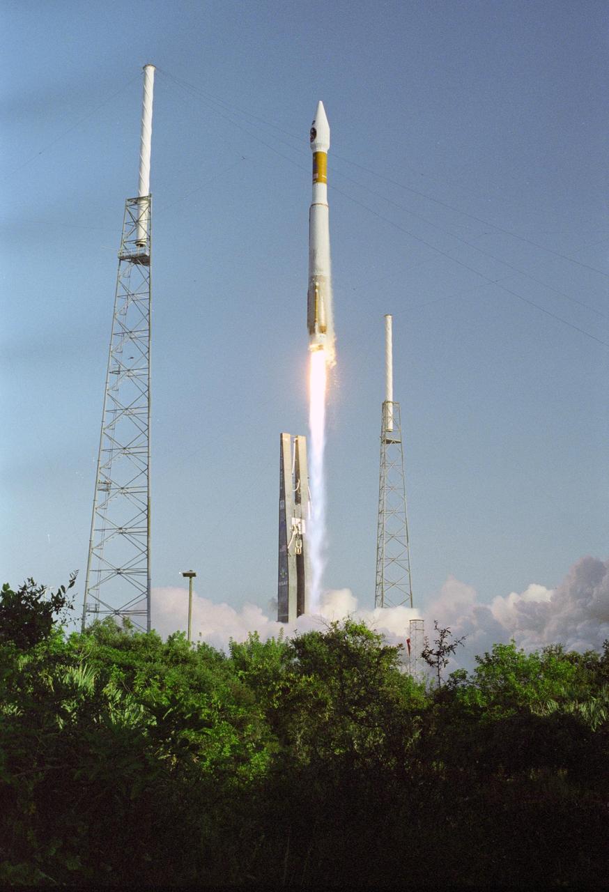 KENNEDY SPACE CENTER, FLA. -    The 19-stories-tall Atlas V launch vehicle leaps above the trees near Launch Complex 41 at Cape Canaveral Air Force Station in Florida, propelling the two-ton Mars Reconnaissance Orbiter (MRO) into a clear blue Florida sky and eventual orbit around Mars.  Liftoff was at 7:43 a.m. EDT. All systems performed nominally for NASA's first launch of an Atlas V on an interplanetary mission. MRO established radio contact with controllers 61 minutes after launch and within four minutes of separation from the upper stage. Initial contact came through an antenna at the Japan Aerospace Exploration Agency's Uchinoura Space Center in southern Japan. Mars is 72 million miles from Earth today, but the spacecraft will travel more than four times that distance on its outbound-arc trajectory to intercept the red planet on March 10, 2006. The orbiter carries six scientific instruments for examining the surface, atmosphere and subsurface of Mars in unprecedented detail from low orbit. NASA expects to get several times more data about Mars from MRO than from all previous Martian missions combined. Researchers will use the instruments to learn more about the history and distribution of Mars' water. That information will improve understanding of planetary climate change and will help guide the quest to answer whether Mars ever supported life. The orbiter will also evaluate potential landing sites for future missions.