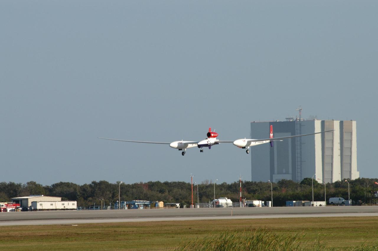 KENNEDY SPACE CENTER, FLA. -   The Virgin Atlantic Airways GlobalFlyer aircraft approaches NASA Kennedy Space Center’s Shuttle Landing Facility for a landing.  The aircraft, piloted by Steve Fossett, is being relocated from Salina, Kan., to the Shuttle Landing Facility to begin preparations for an attempt to set a new world record for the longest flight made by any aircraft. An exact takeoff date for the record-setting flight has not been determined and is contingent on weather and jet-stream conditions. The window for the attempt opens in mid-January, making the flight possible anytime between then and the end of February.  NASA agreed to let Virgin Atlantic Airways use Kennedy's Shuttle Landing Facility as a takeoff site. The facility use is part of a pilot program to expand runway access for non-NASA activities.