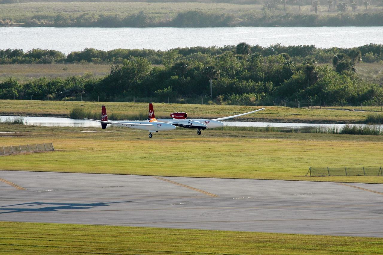 KENNEDY SPACE CENTER, FLA. -    The Virgin Atlantic Airways GlobalFlyer aircraft approaches NASA Kennedy Space Center’s Shuttle Landing Facility for a landing.  The aircraft, piloted by Steve Fossett, is being relocated from Salina, Kan., to the Shuttle Landing Facility to begin preparations for an attempt to set a new world record for the longest flight made by any aircraft. An exact takeoff date for the record-setting flight has not been determined and is contingent on weather and jet-stream conditions. The window for the attempt opens in mid-January, making the flight possible anytime between then and the end of February.  NASA agreed to let Virgin Atlantic Airways use Kennedy's Shuttle Landing Facility as a takeoff site. The facility use is part of a pilot program to expand runway access for non-NASA activities.